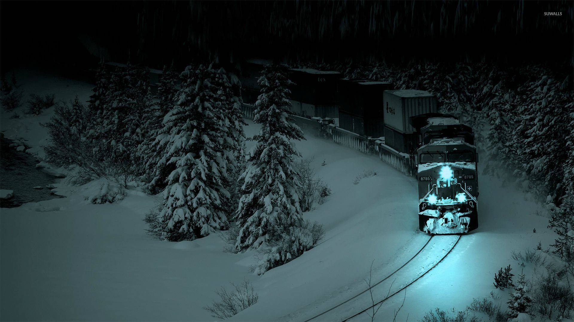 920x1080 HD Winter Desktop, snow-covered freight train, glowing headlights, Full HD Desktop Wallpaper