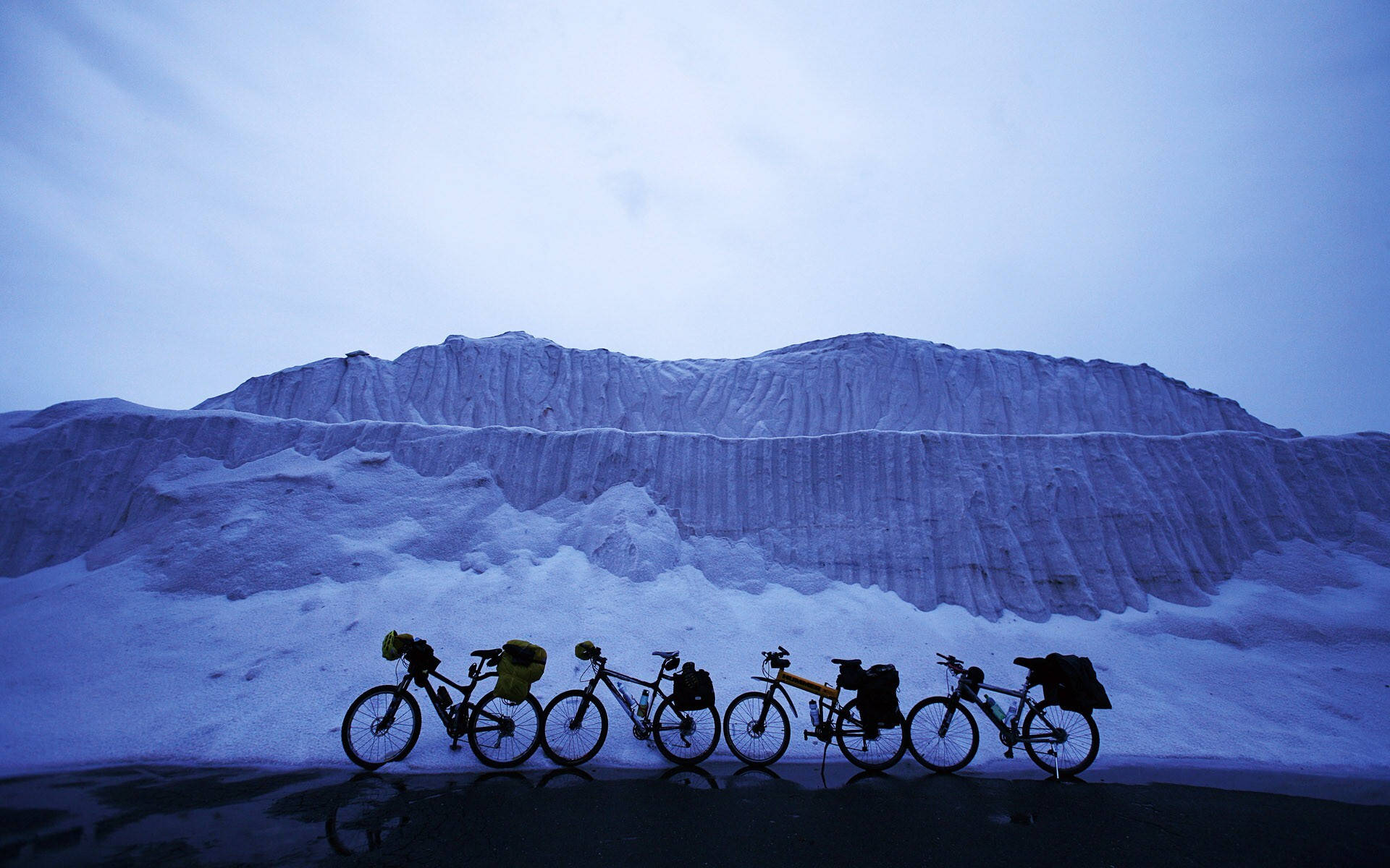 Winter Season Bicycles, snow-covered mountain, pale blue twilight sky, Full HD Desktop Wallpaper