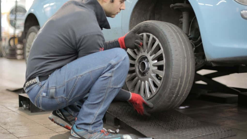 Winter Tires, light blue car, garage, SD Desktop Wallpaper