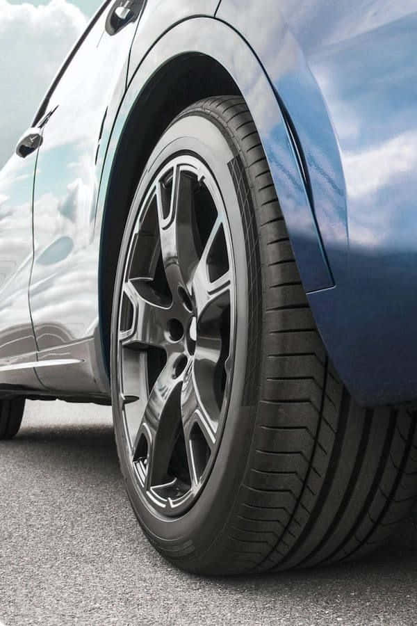 Winter Tires, 600 x 900, sleek blue car, SD Phone Wallpaper