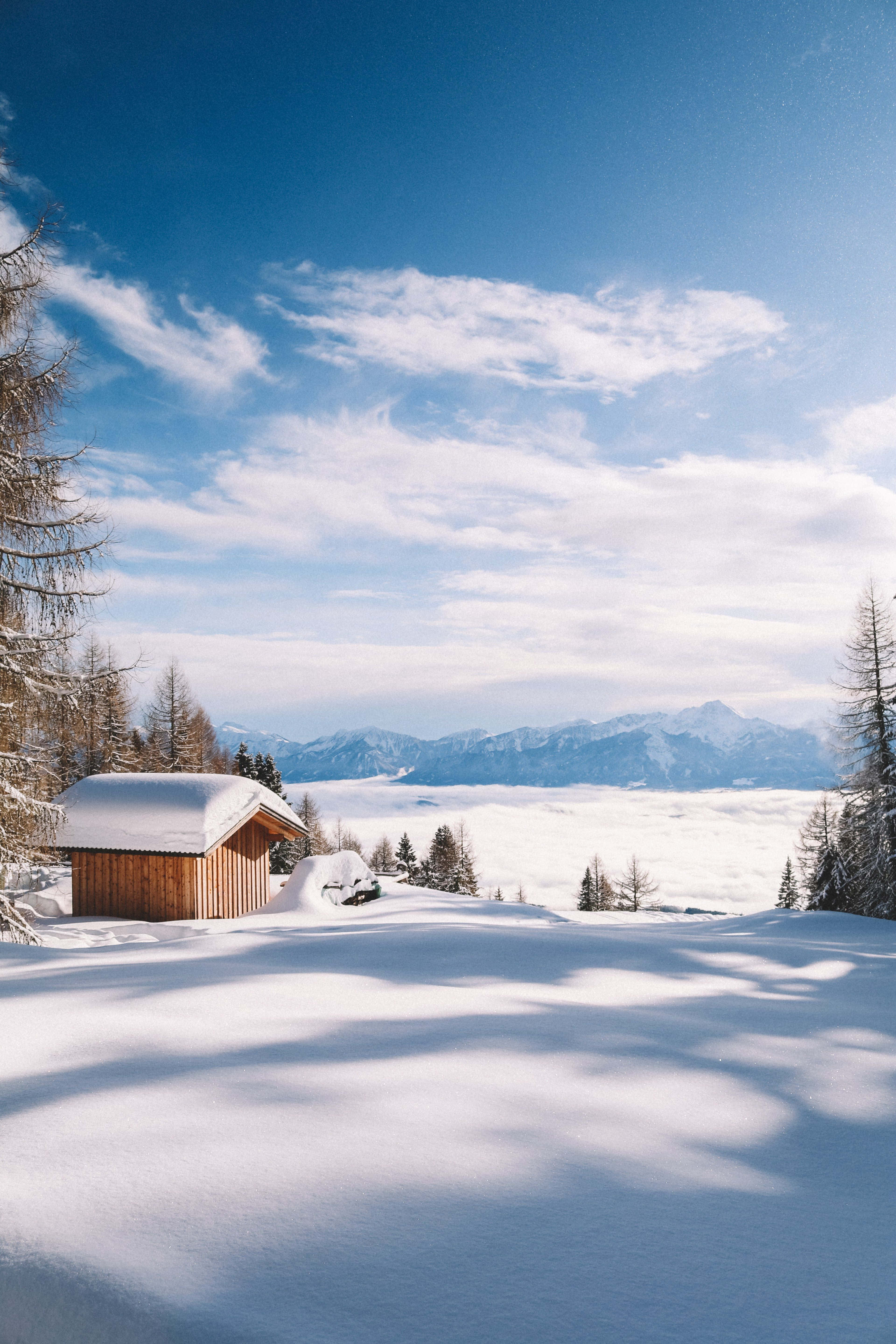 Winter wonderland, wooden cabin, snow-covered mountains, 5K Phone Wallpaper