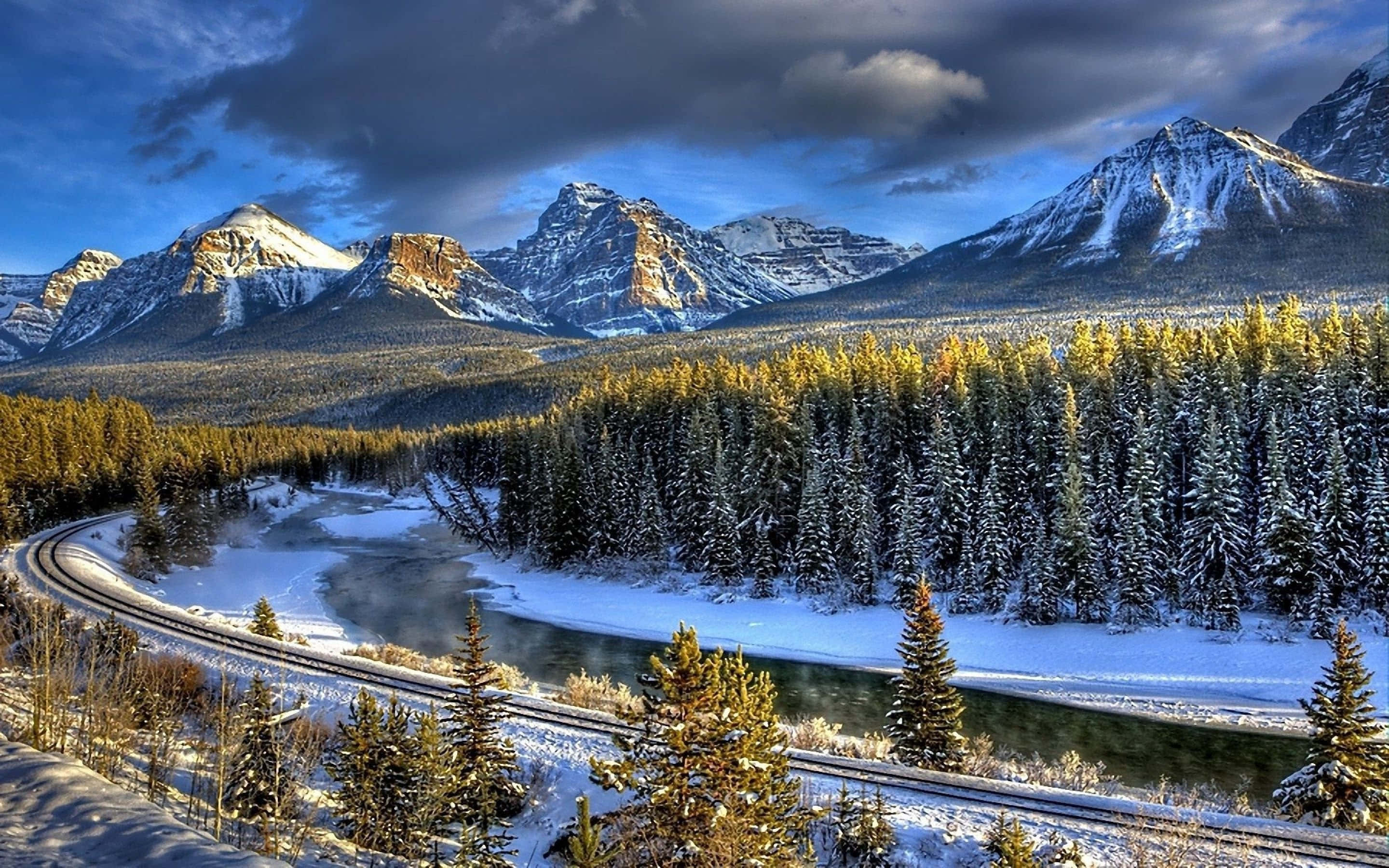 Winter wonderland, snowcapped mountains, winding river, 2K Desktop Wallpaper