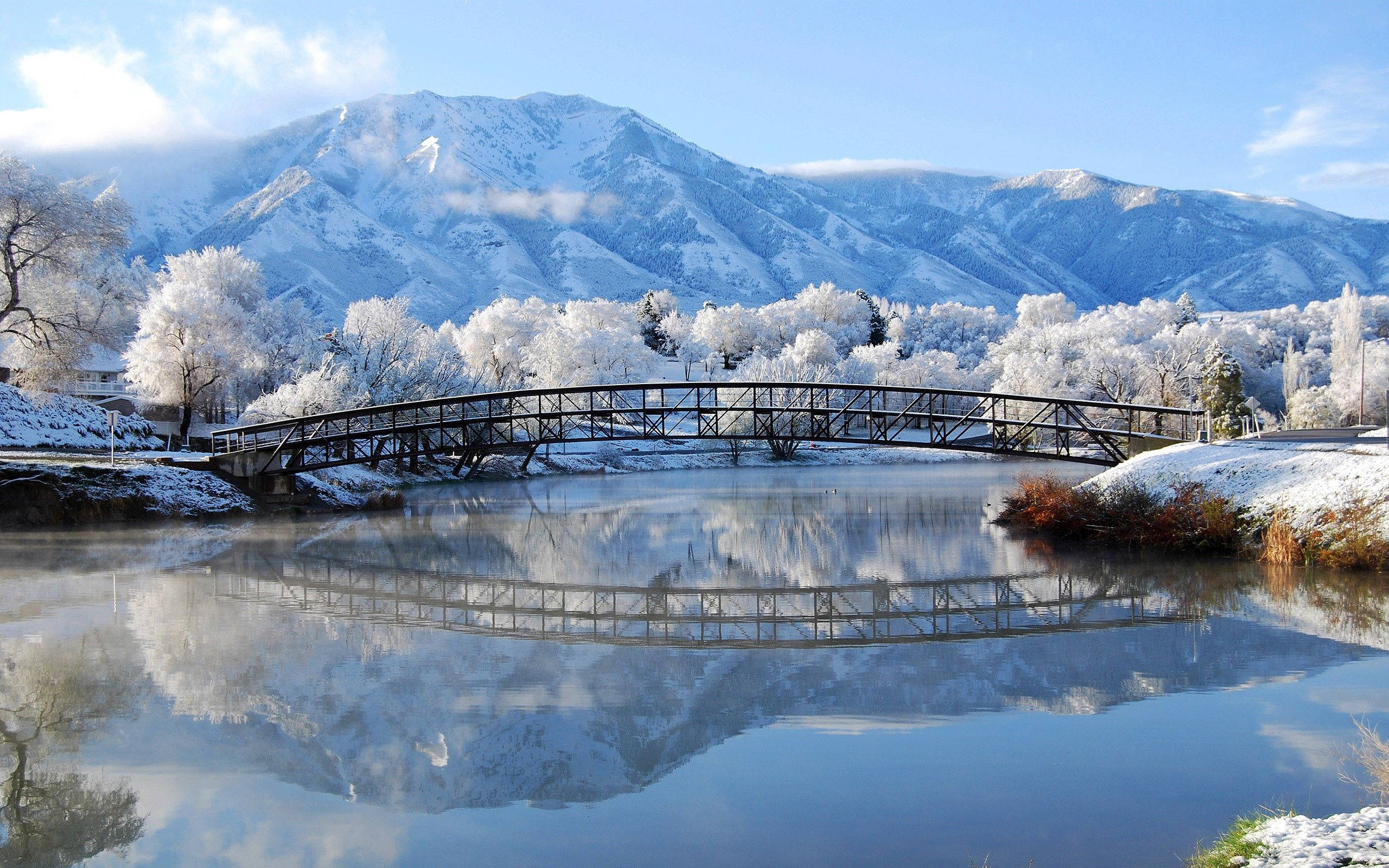 Winter Bridge Landscape, snow-covered bridge, calm river, 2K Desktop Wallpaper