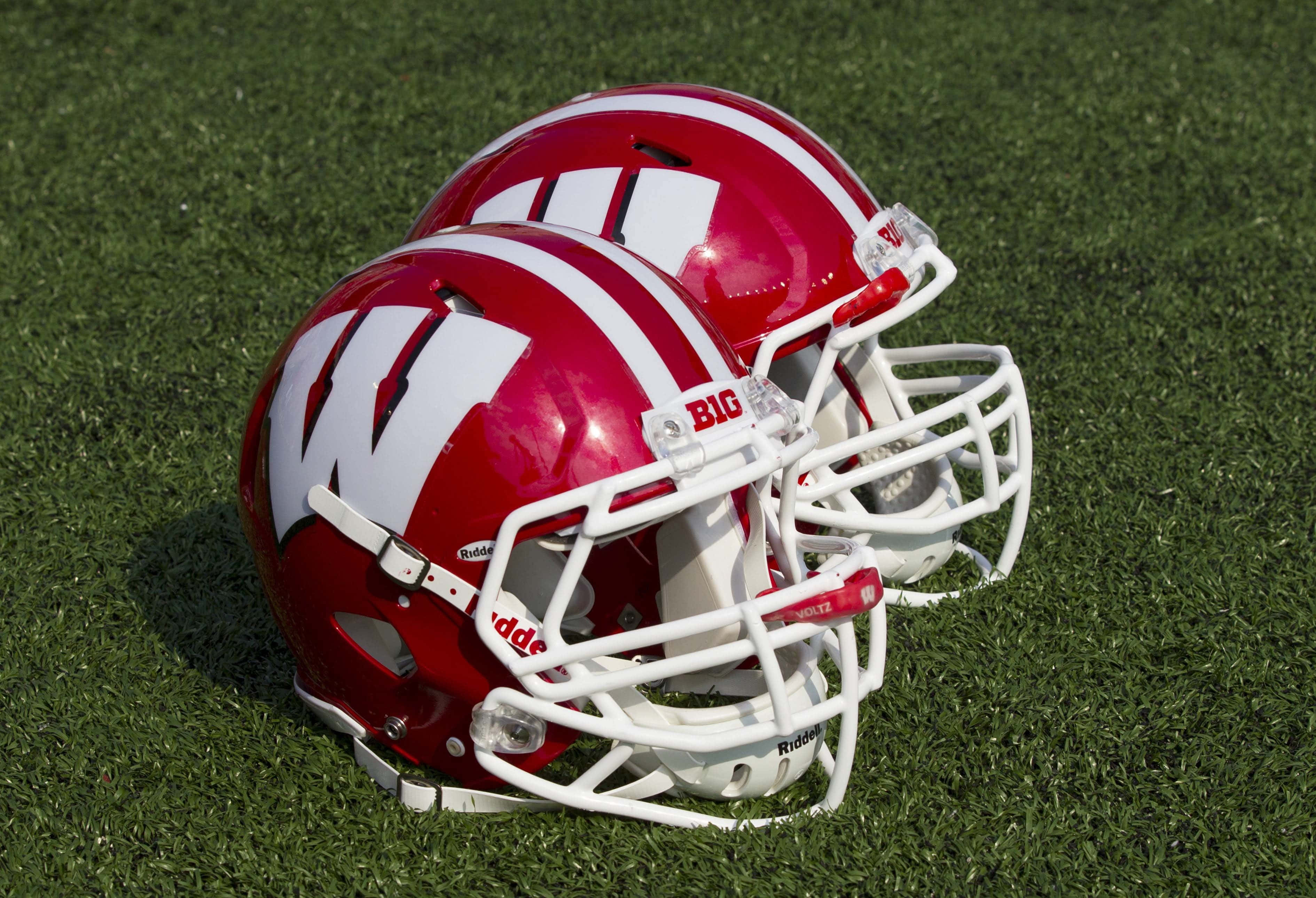 Wisconsin Badgers, red and white football helmets, large W logos, 2K Desktop Wallpaper