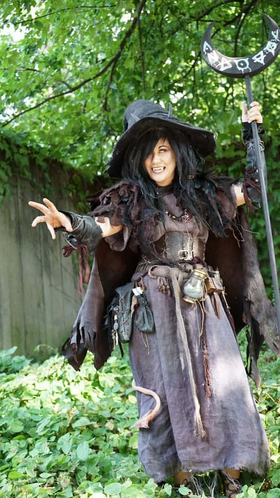 witch costume, tattered dark costume, sunlit garden, SD Phone Wallpaper
