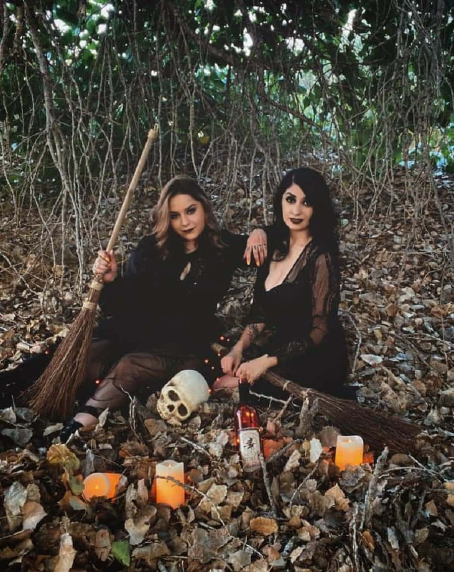 witch costumes, two women dressed as witches, leafy forest, SD Phone Wallpaper