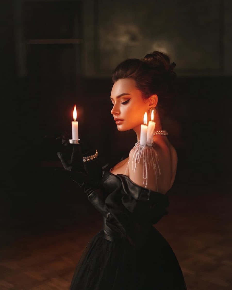 black gown, lit candles, dimly lit room, SD Phone Wallpaper