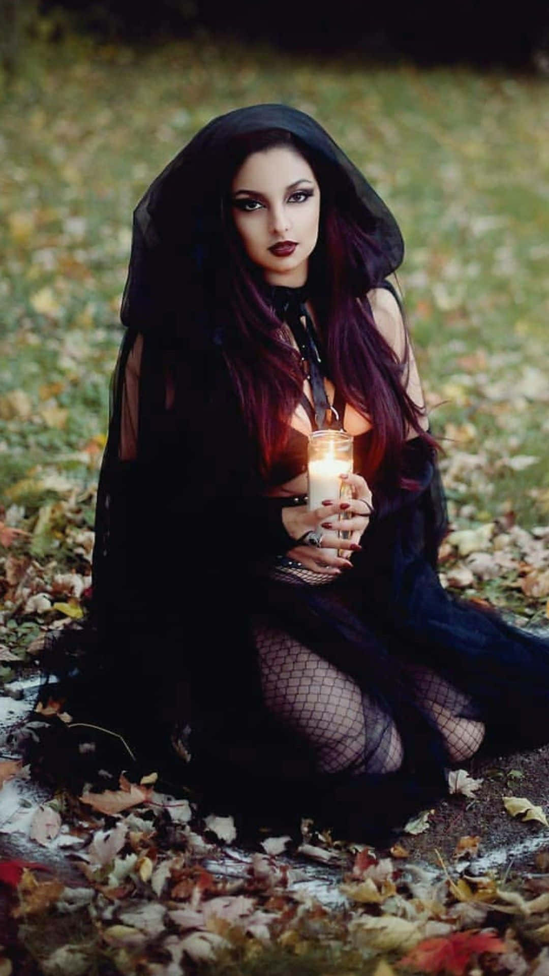 black hooded cloak, autumn leaves, lit candle, Full HD Phone Wallpaper
