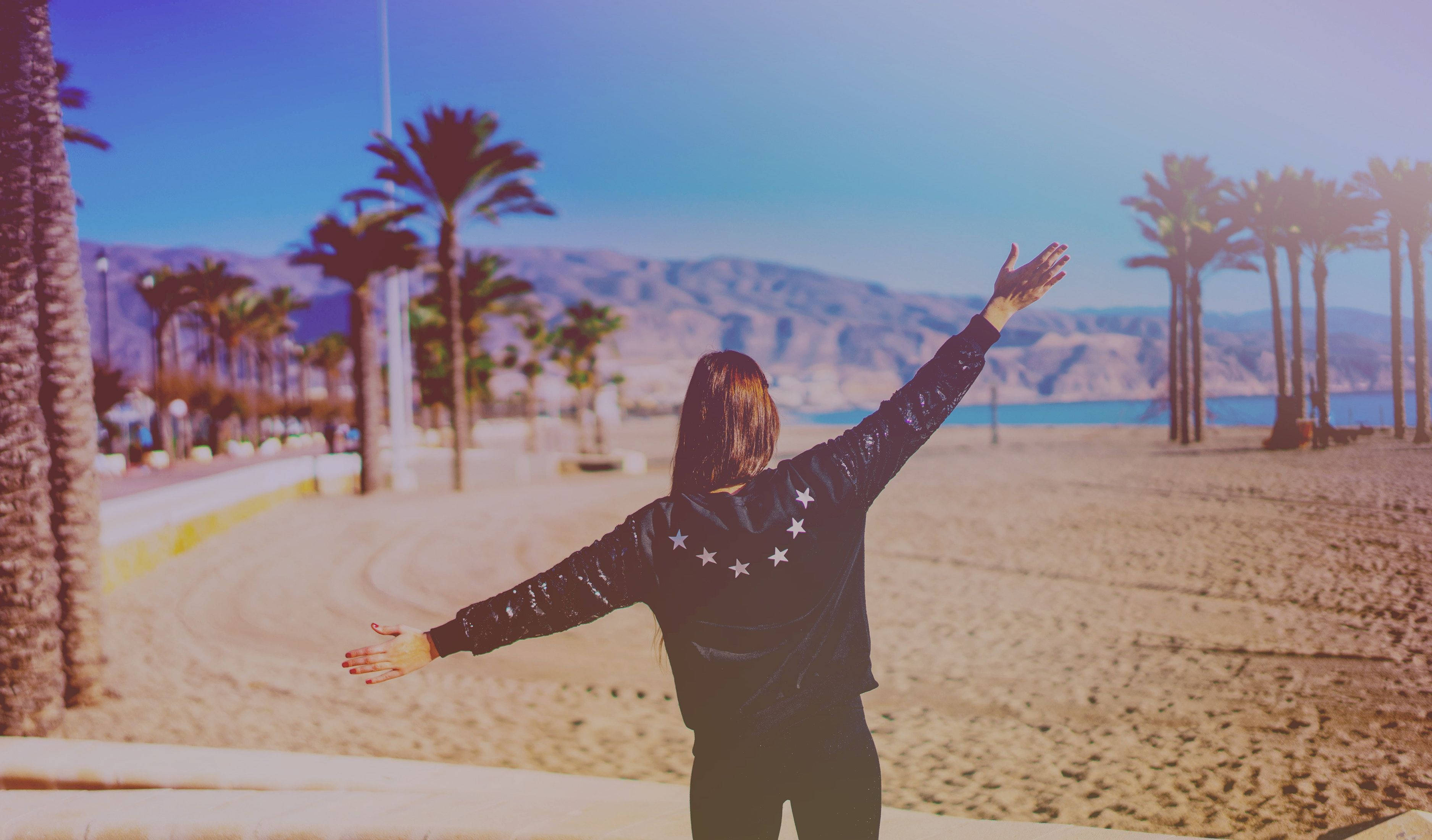 woman beach, polaroid, sunlit beachfront promenade, 2K Desktop Wallpaper