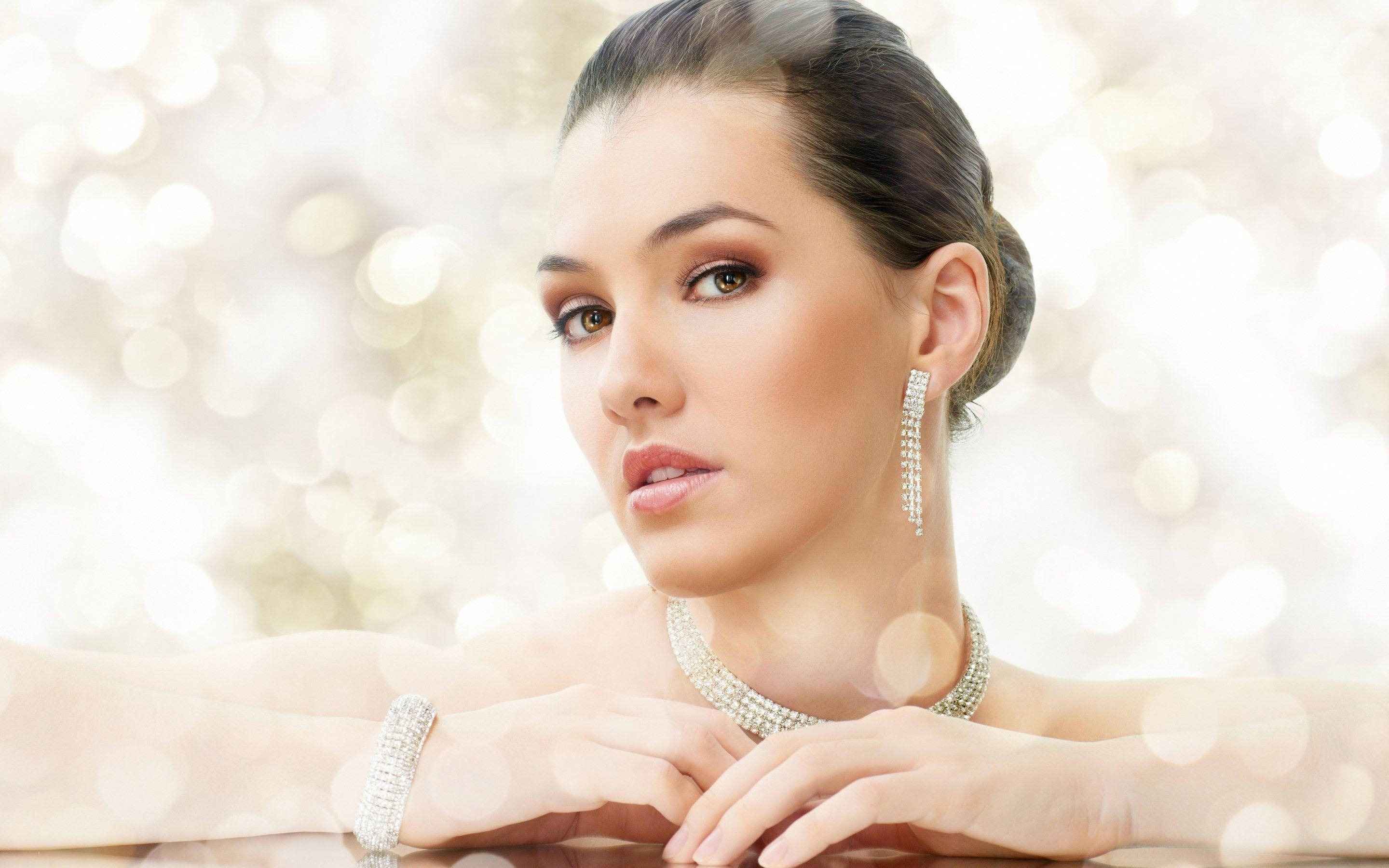 beautiful woman, sparkling diamond jewelry, radiant bokeh background, 2K Desktop Wallpaper