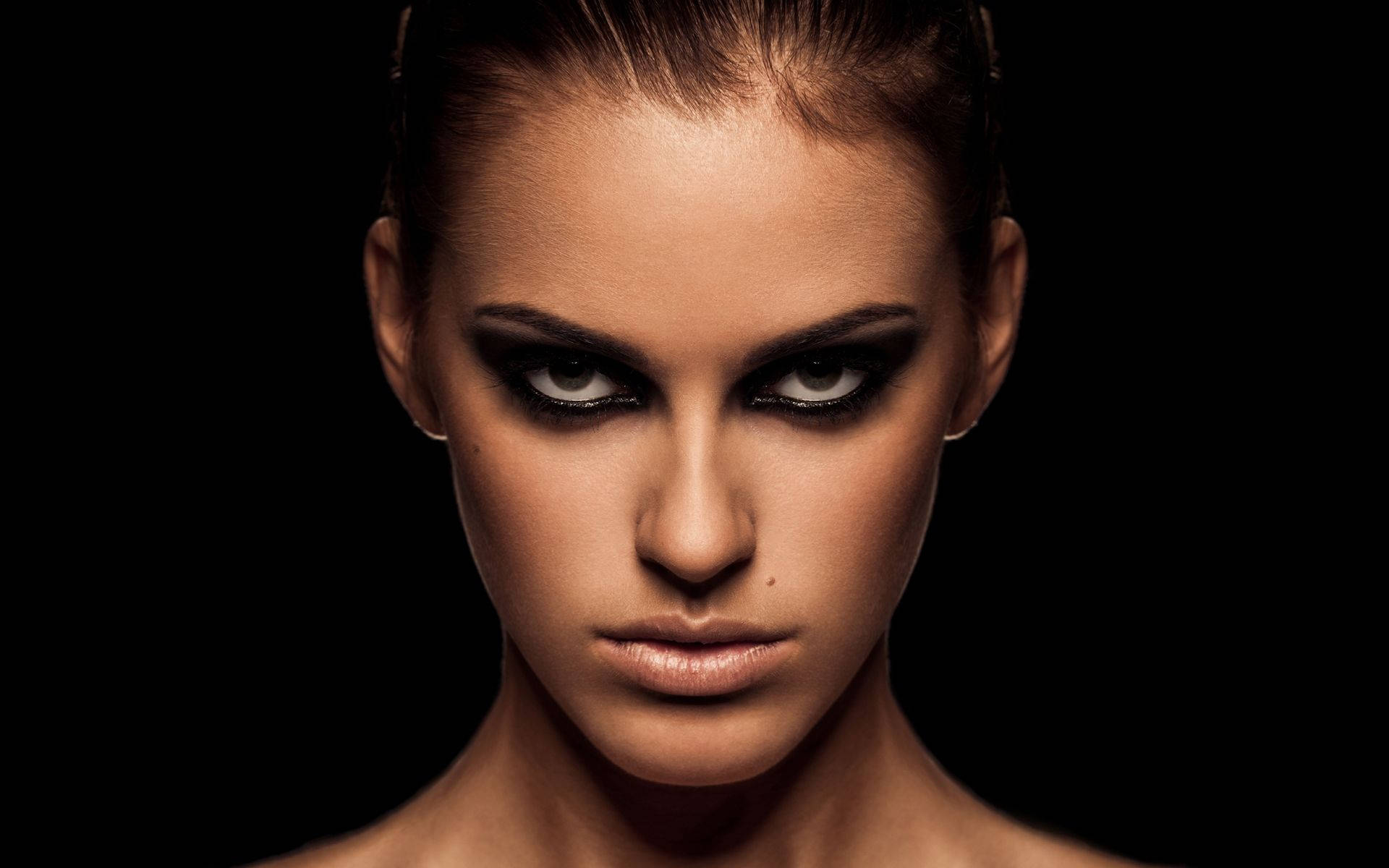 fierce woman face, intense gaze, bold dark makeup, Full HD Desktop Wallpaper