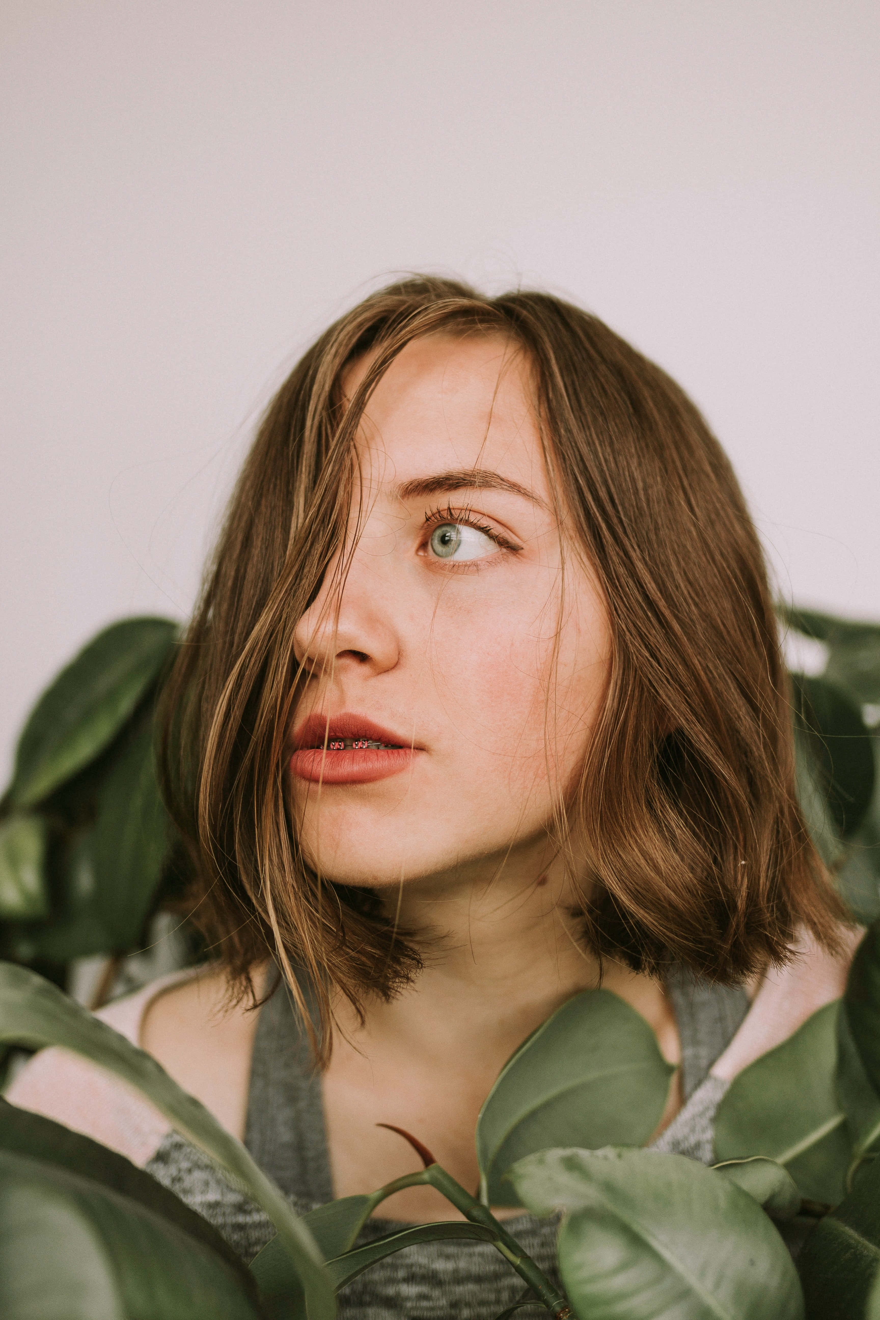 girl with leaves face, brown hair, green eyes, 5K Phone Wallpaper