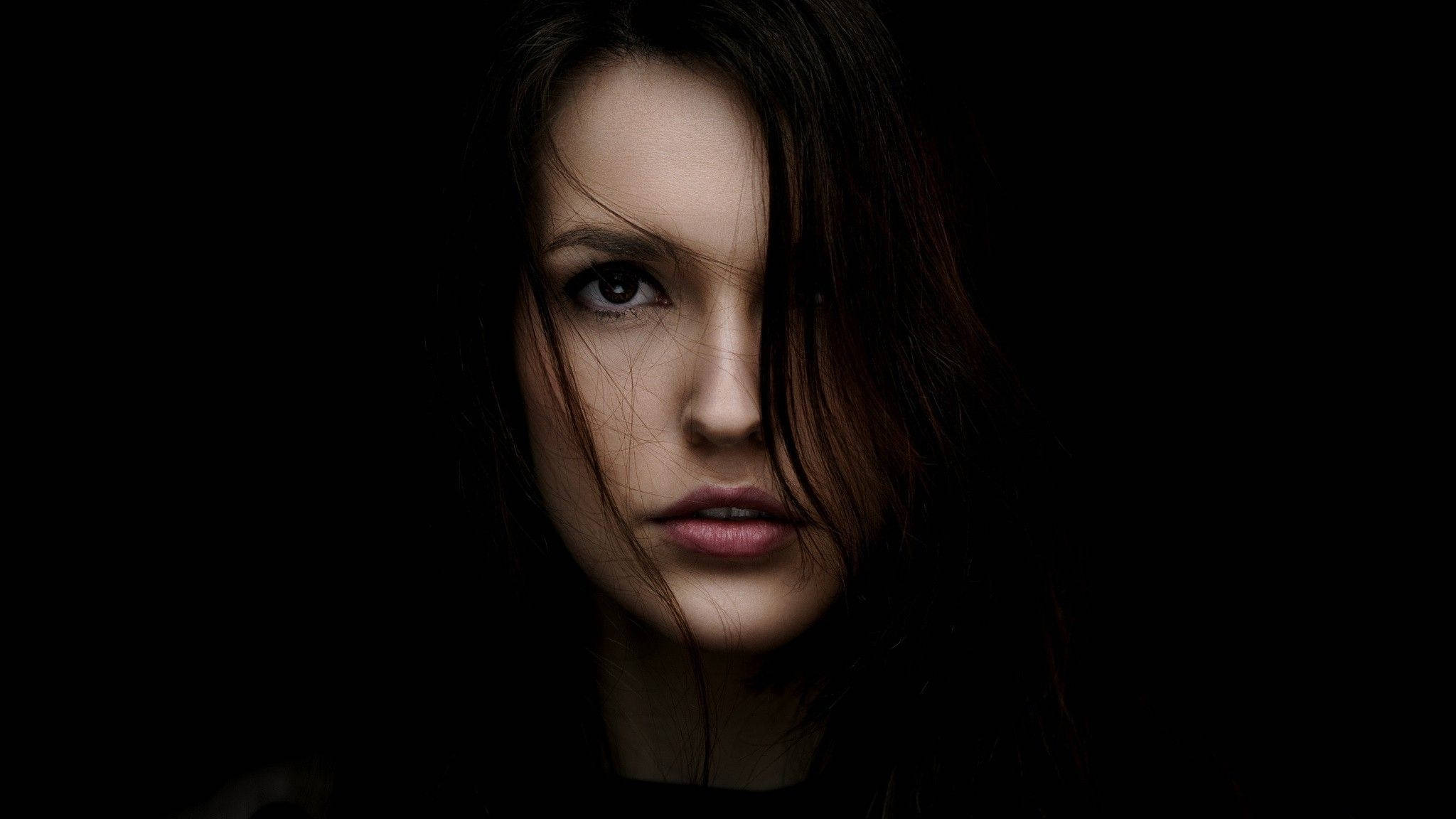 dark woman face, intense gaze, shadowed darkness, Full HD Desktop Wallpaper