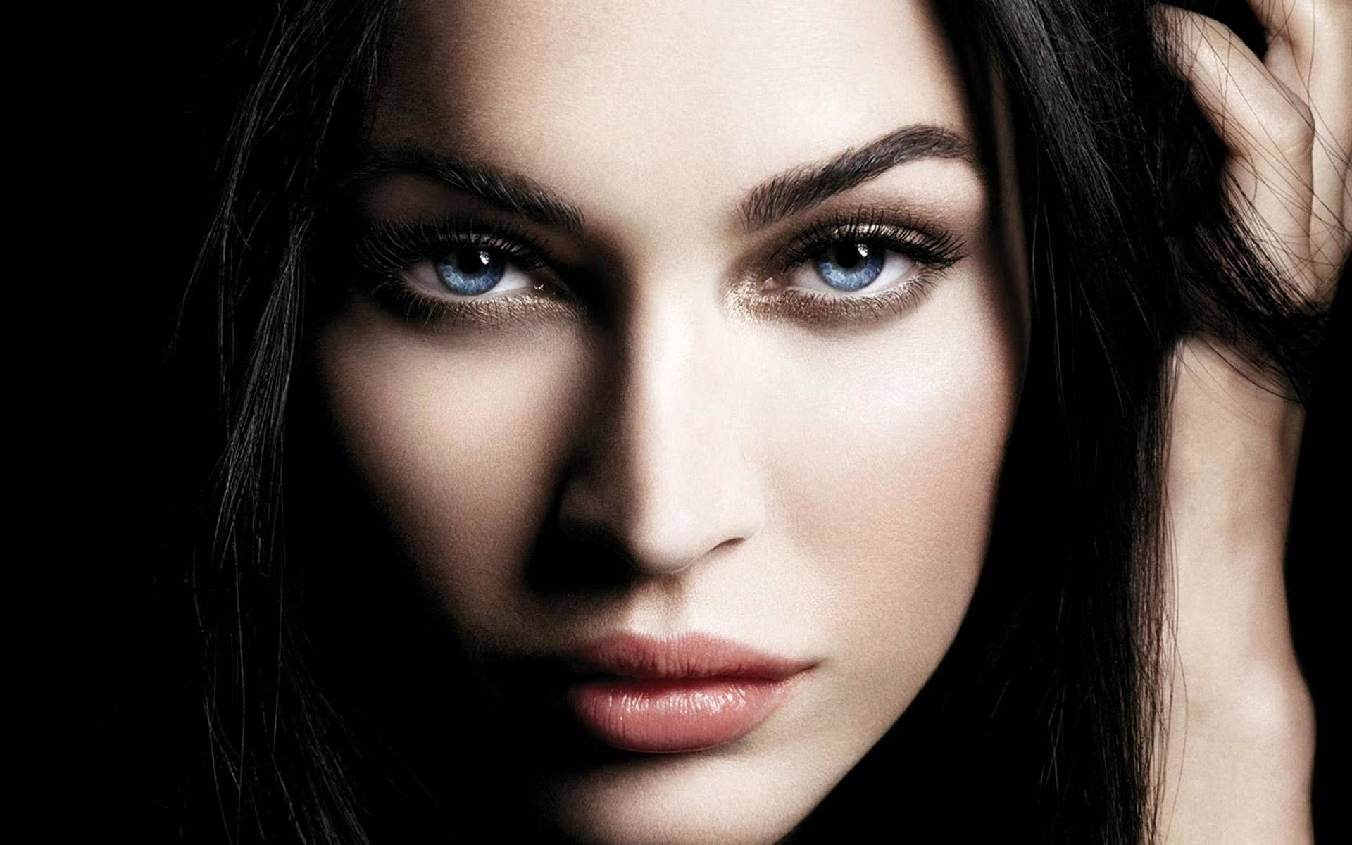 symmetric woman face, piercing blue eyes, dark hair, Full HD Desktop Wallpaper