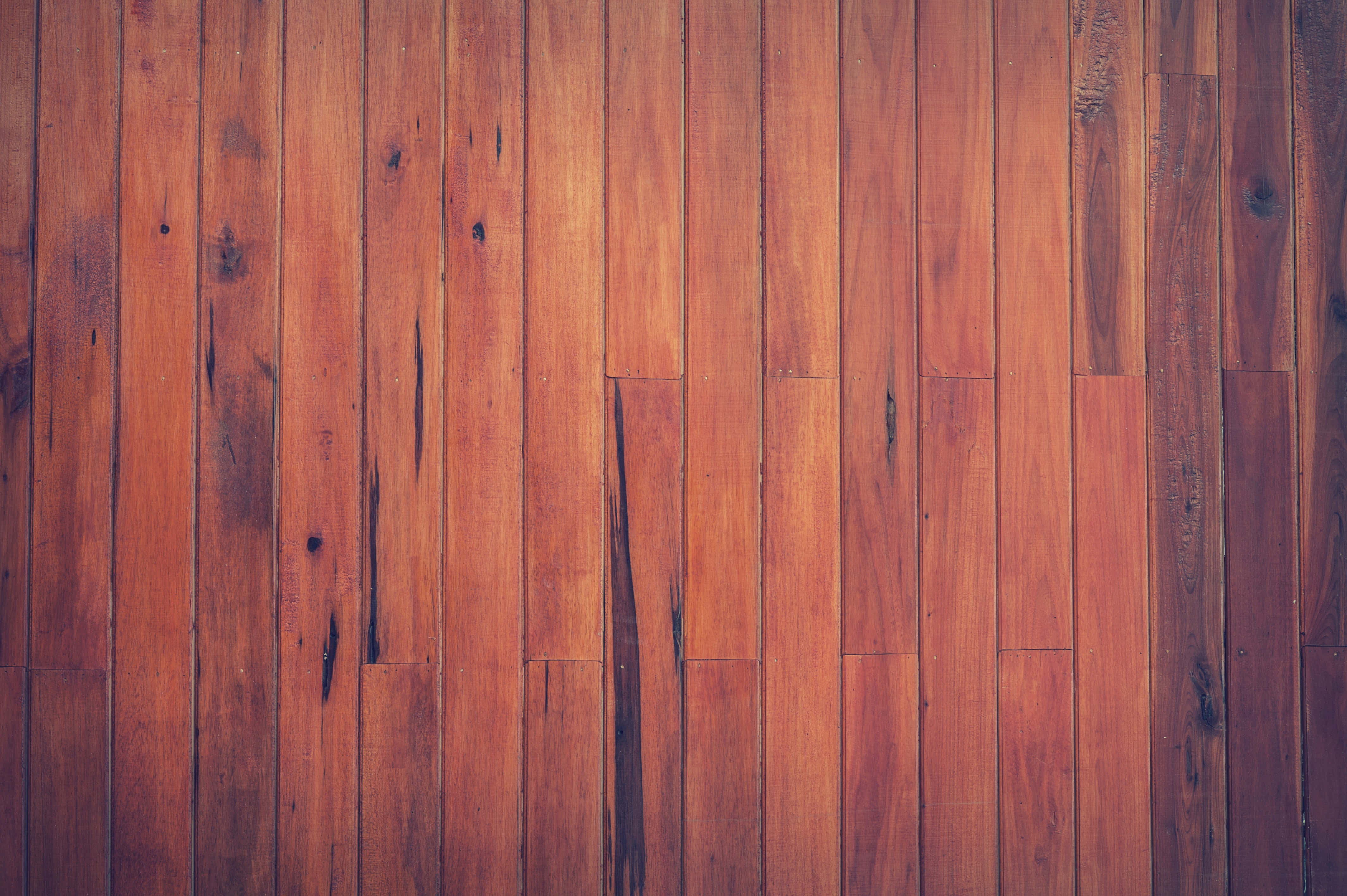 pristine wood floor, warm-toned wooden planks, natural grain, 4K Desktop Wallpaper