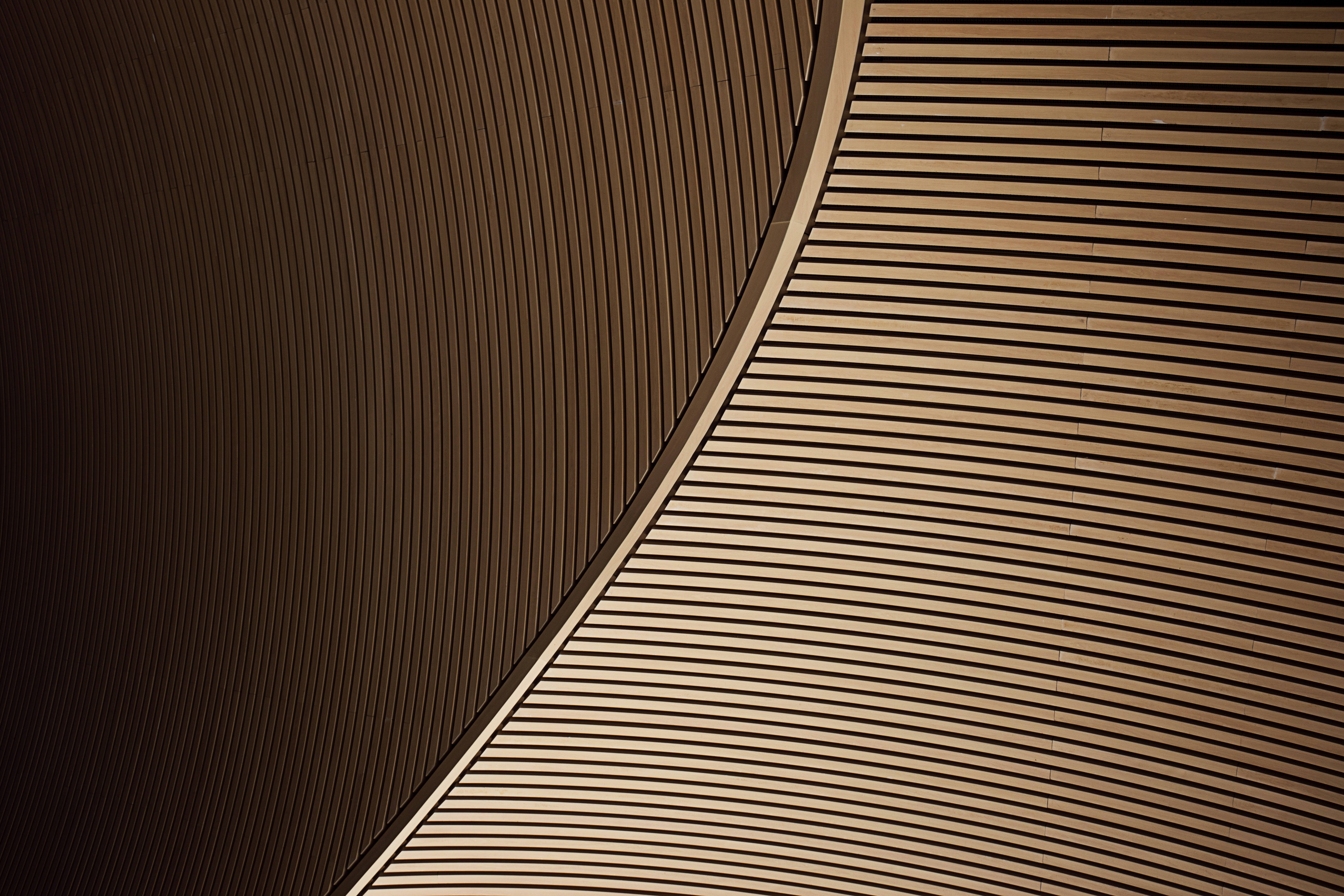 coastal sunset, curved wooden slats, warm tones, 5K Desktop Wallpaper