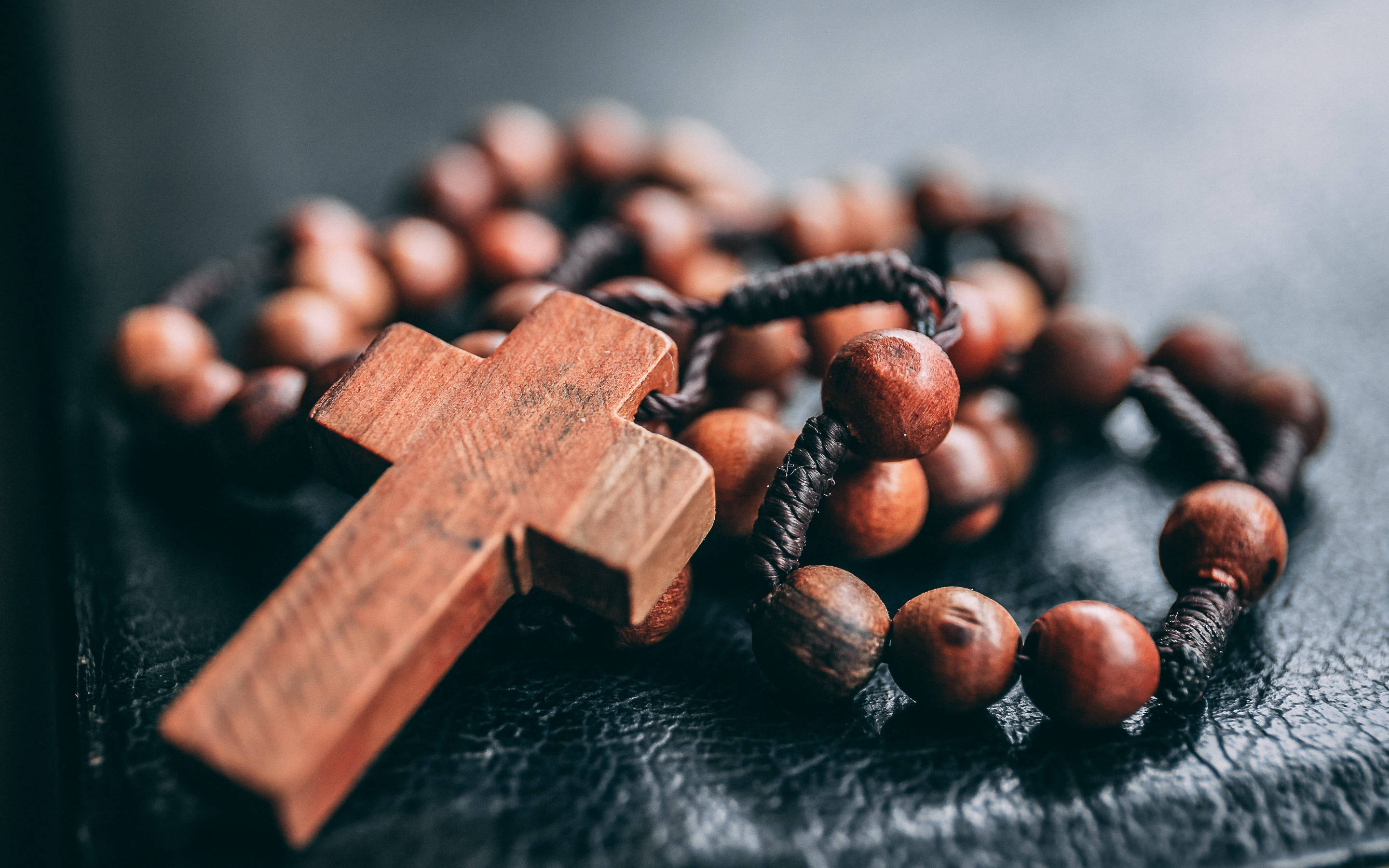 wooden rosary, cross, dark textured leather, 2K Desktop Wallpaper