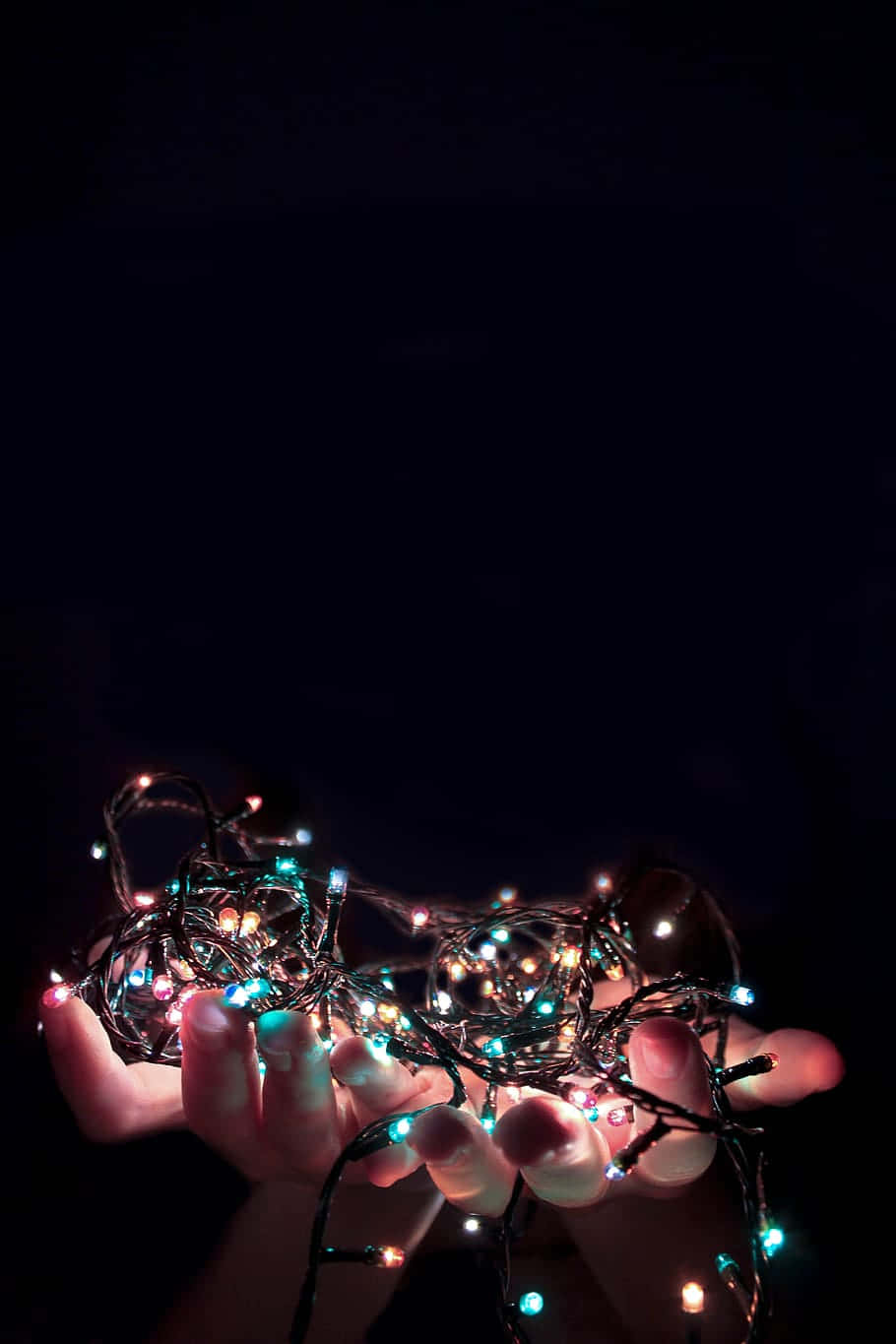 910 x 1365, glowing tangle of colorful fairy lights, deep black background, HD Phone Wallpaper