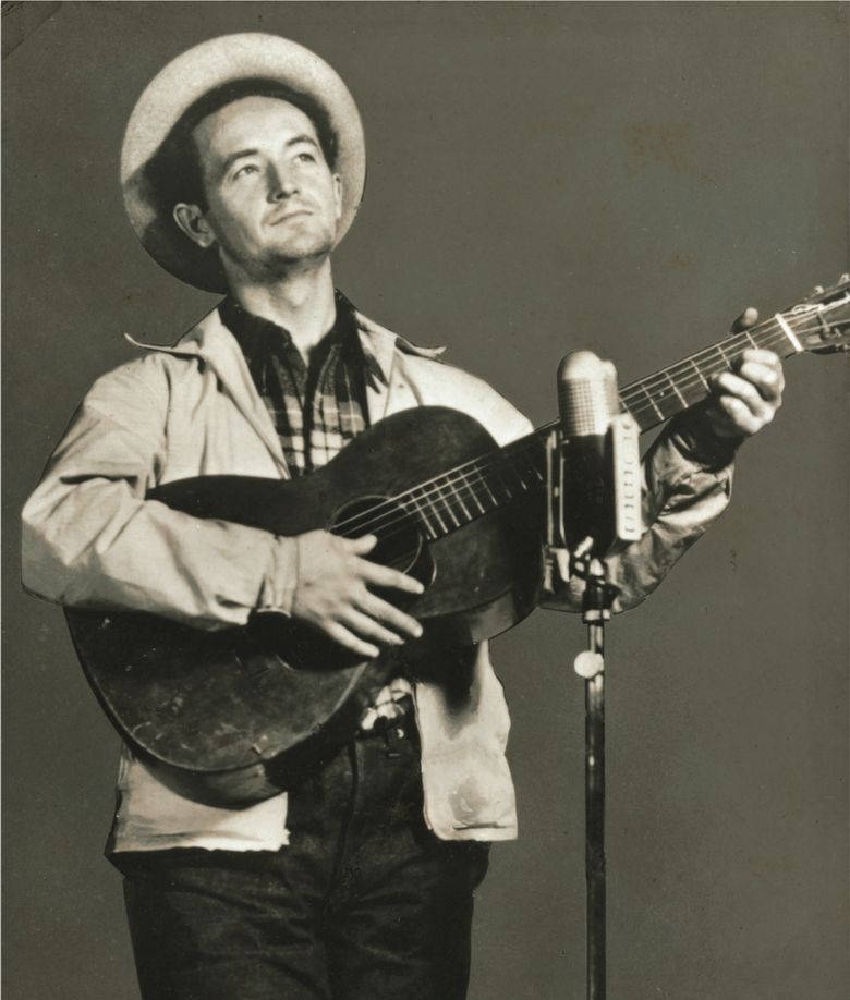 Woody Guthrie, acoustic guitar, cowboy hat, SD Phone Wallpaper