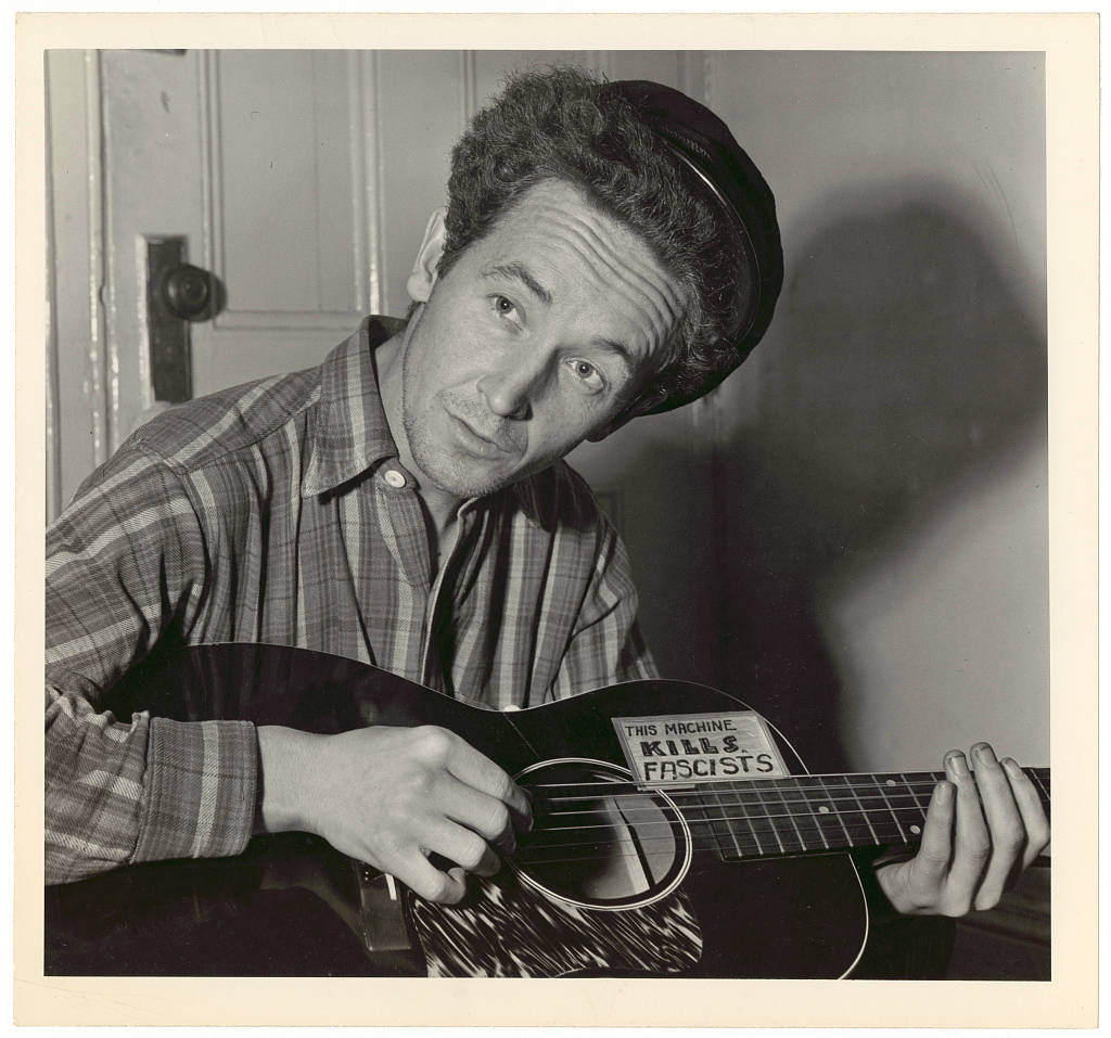 Woody Guthrie, plaid shirt, cap, SD Desktop Wallpaper
