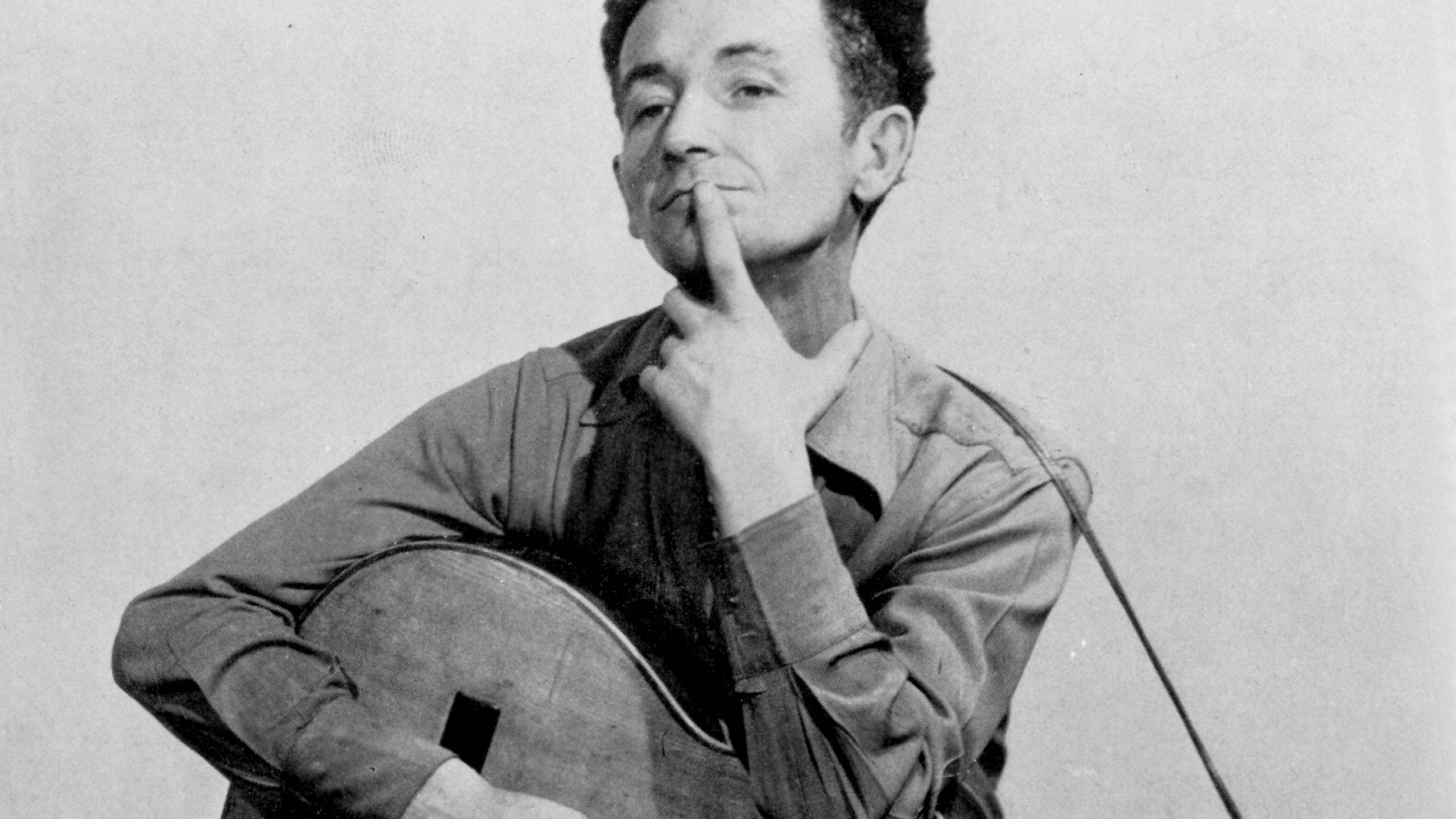 Woody Guthrie, guitar, black and white portrait, 2K Desktop Wallpaper