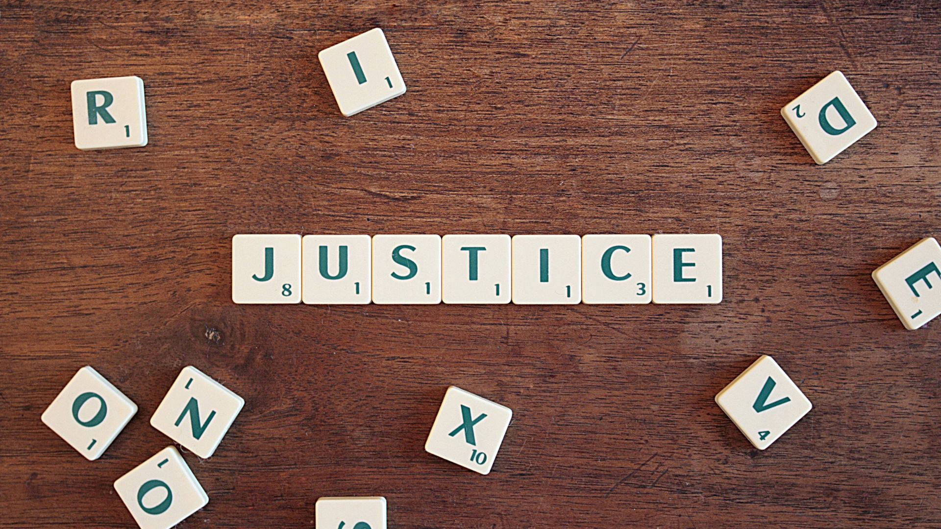 Scramble Justice Word, green letter tiles, rustic wooden table, Full HD Desktop Wallpaper