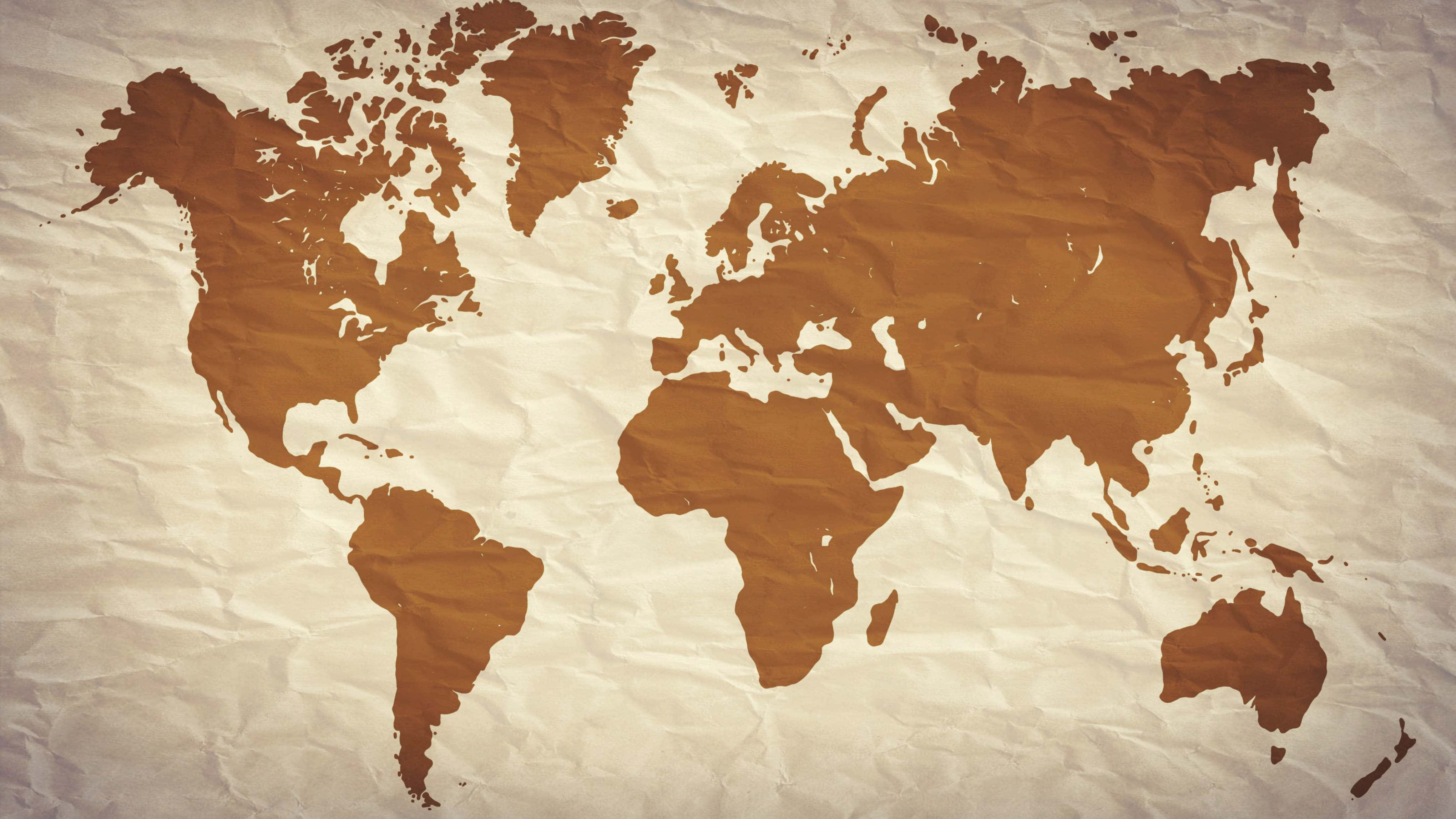 vintage world map, warm brown tones, textured crumpled parchment paper, 4K Desktop Wallpaper