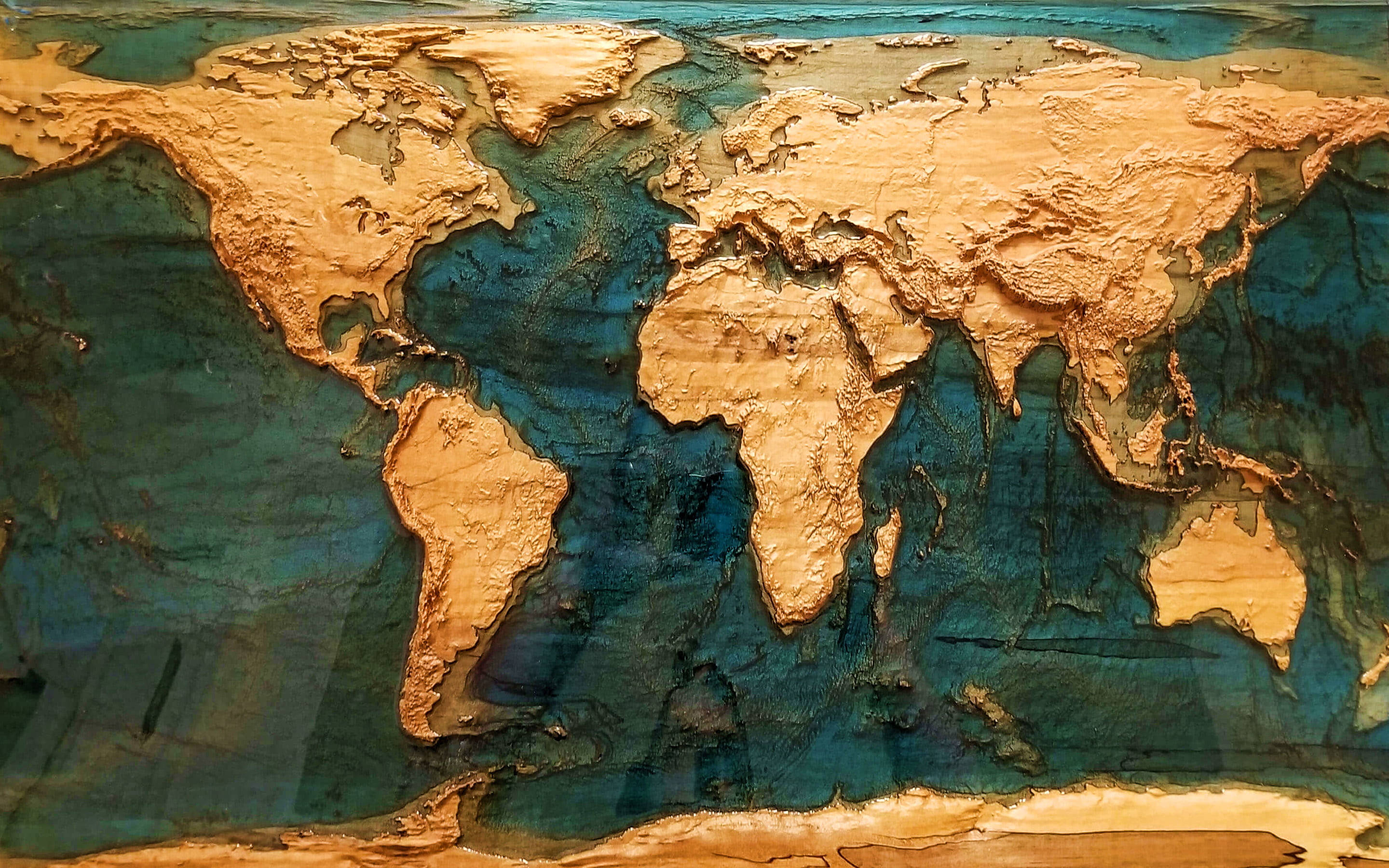 3D Vintage World Map, golden continents, deep teal oceans, 2K Desktop Wallpaper