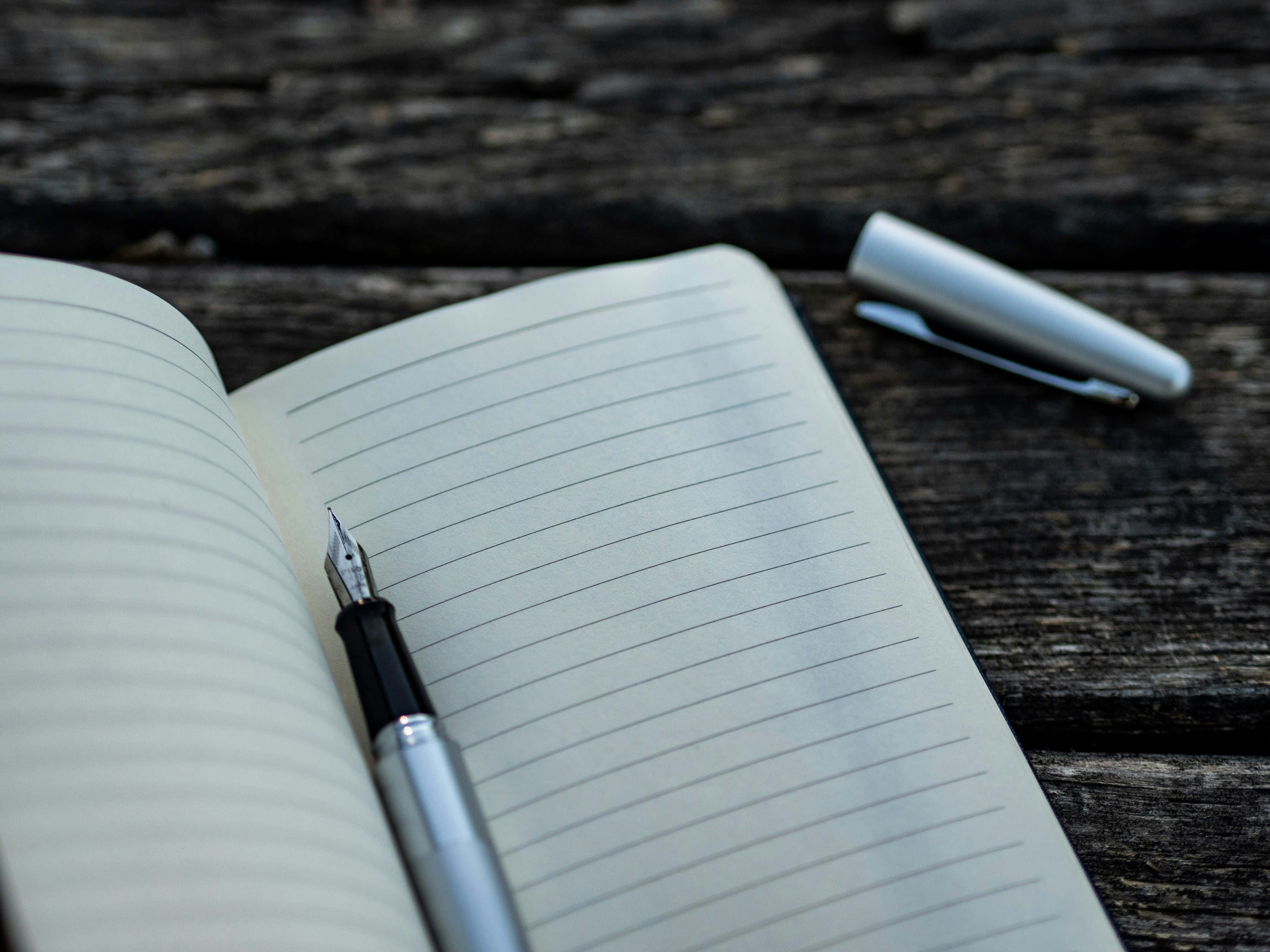 silver fountain pen, blank lined pages, open notebook, 4K Desktop Wallpaper