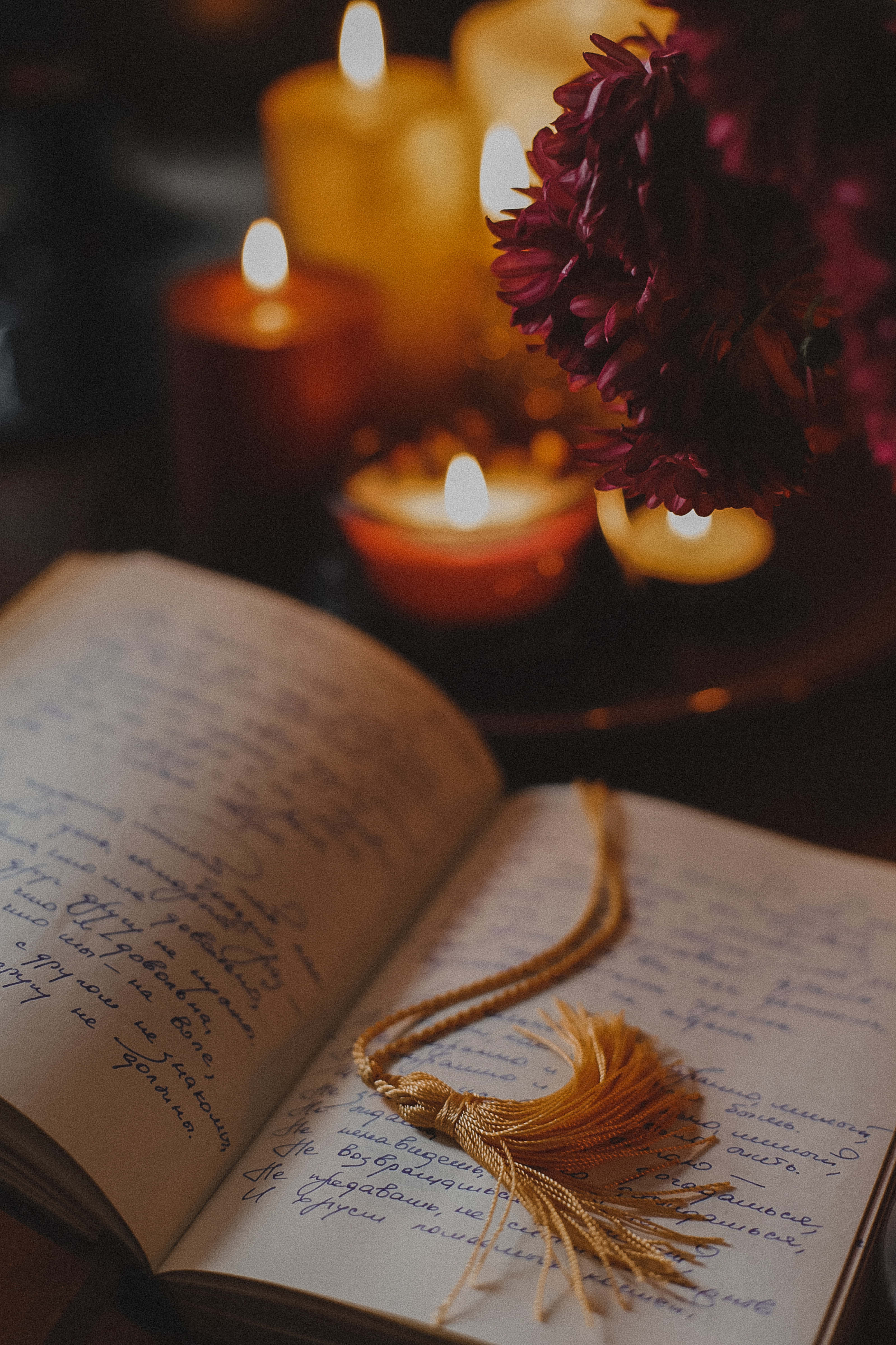 Poem With A Tassel Bookmark, golden tassel, glowing candles, 4K Phone Wallpaper