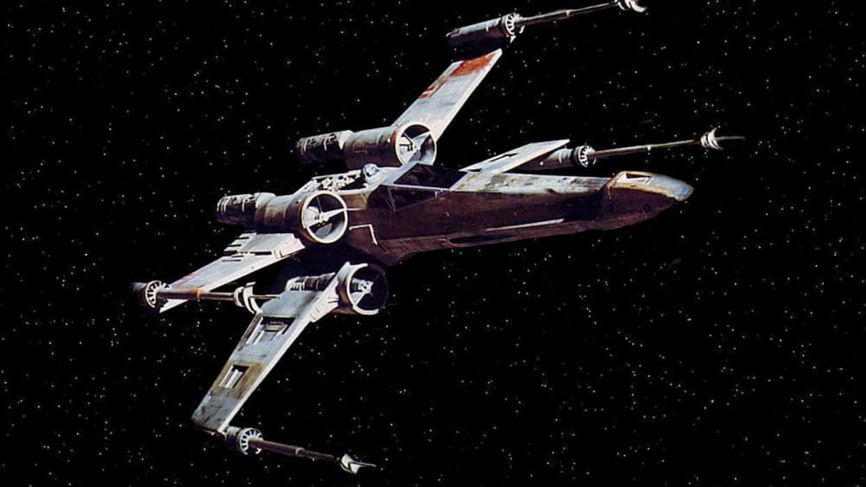 X-wing Fighter, star-filled void, battle scars, SD Desktop Wallpaper