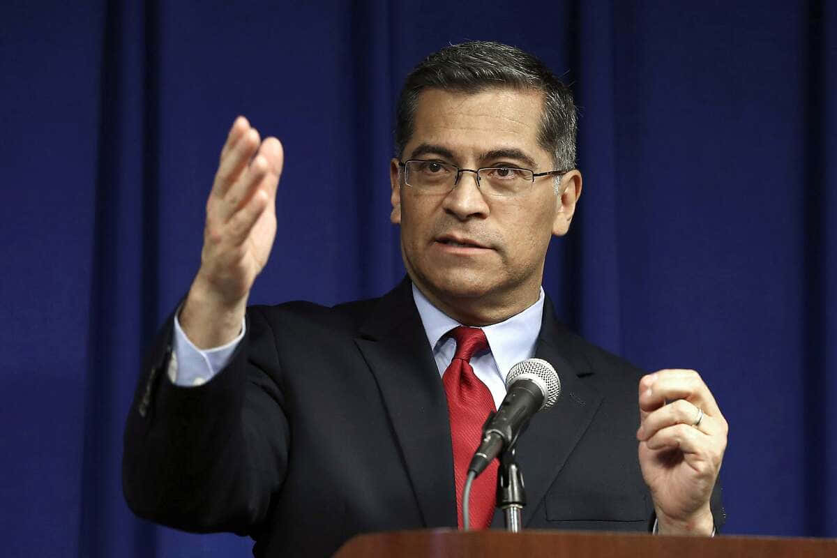 Xavier Becerra, dark suit, red tie, SD Desktop Wallpaper