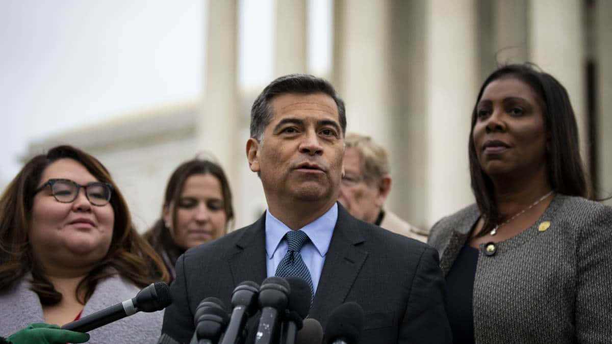 Xavier Becerra, press conference, microphones, SD Desktop Wallpaper