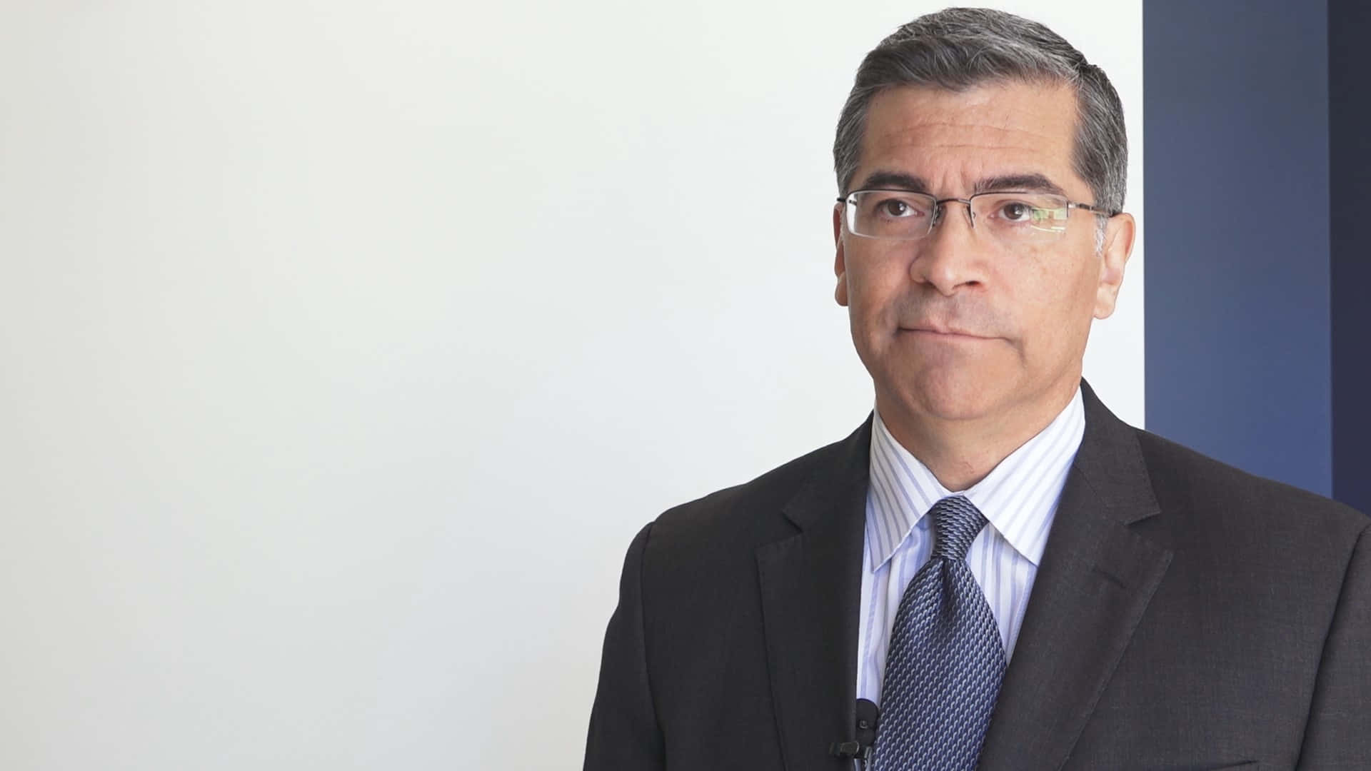 Xavier Becerra, poker face, dark suit, Full HD Desktop Wallpaper