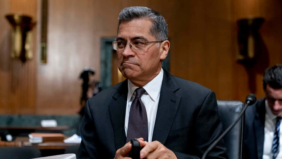 Xavier Becerra, dark suit, glasses, SD Desktop Wallpaper