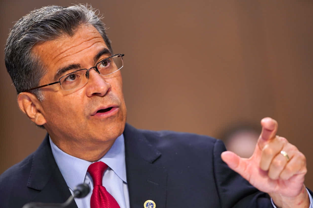 Xavier Becerra, dark suit, red tie, SD Desktop Wallpaper