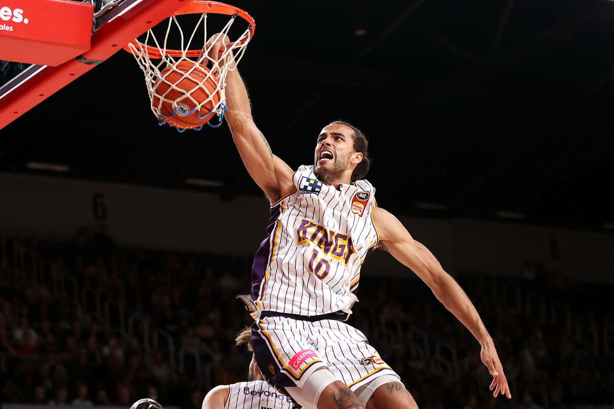 Xavier Cooks, white and purple striped jersey, dunks the ball, SD Desktop Wallpaper