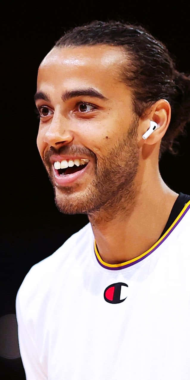 Xavier Cooks, white Champion jersey, earbuds, SD Phone Wallpaper