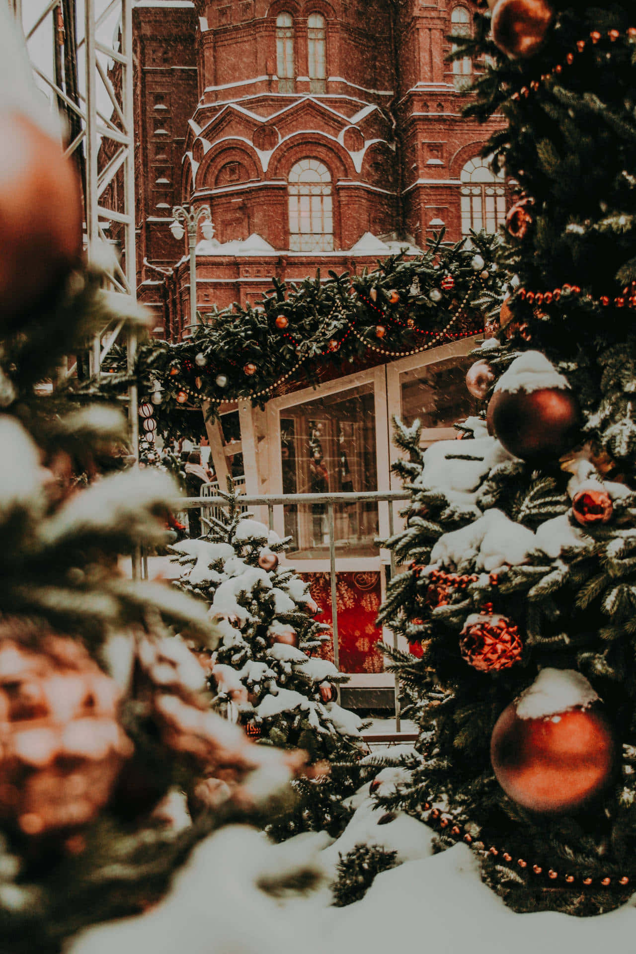 snowy christmas market, historic red brick building, snow-dusted Christmas trees, Full HD Phone Wallpaper