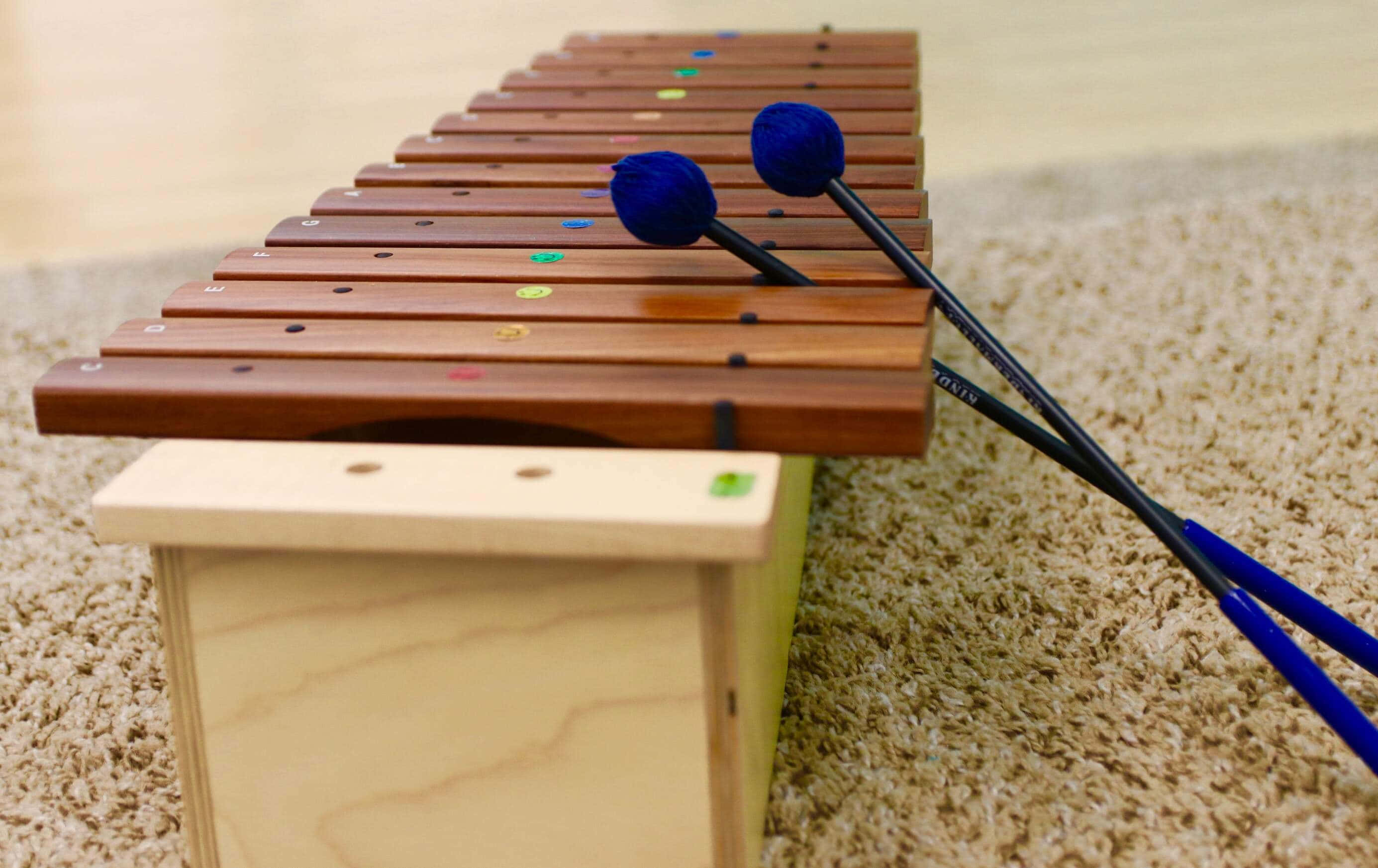 wooden xylophone, colorful keys, blue mallets, 2K Desktop Wallpaper