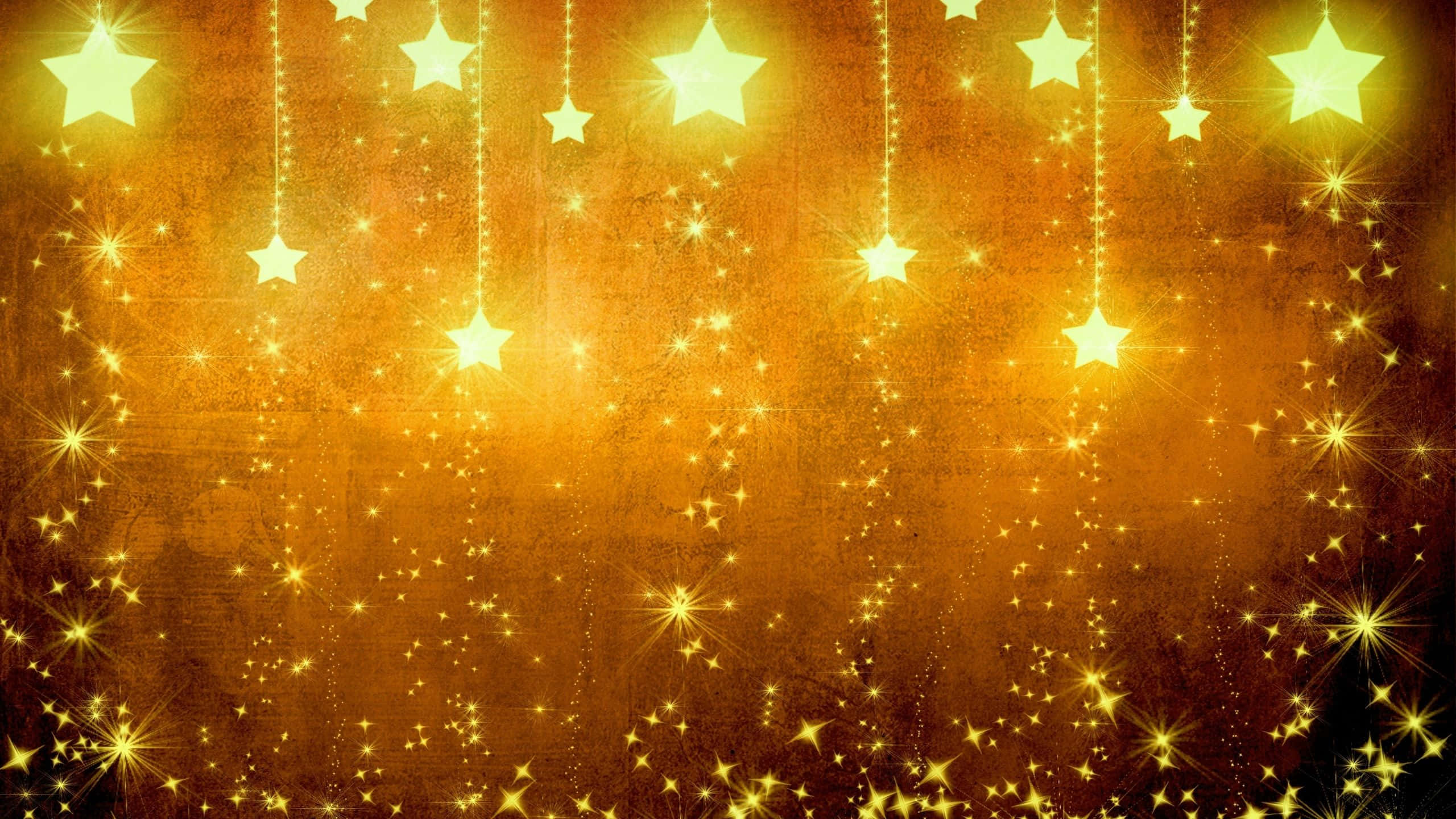 yellow 2560 x 1440, golden stars, textured amber background, 2K Desktop Wallpaper