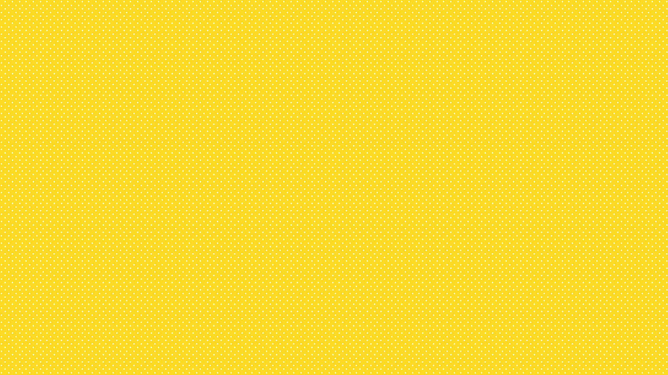 yellow aesthetic desktop, vibrant yellow background, subtle white polka dot pattern, 2K Desktop Wallpaper