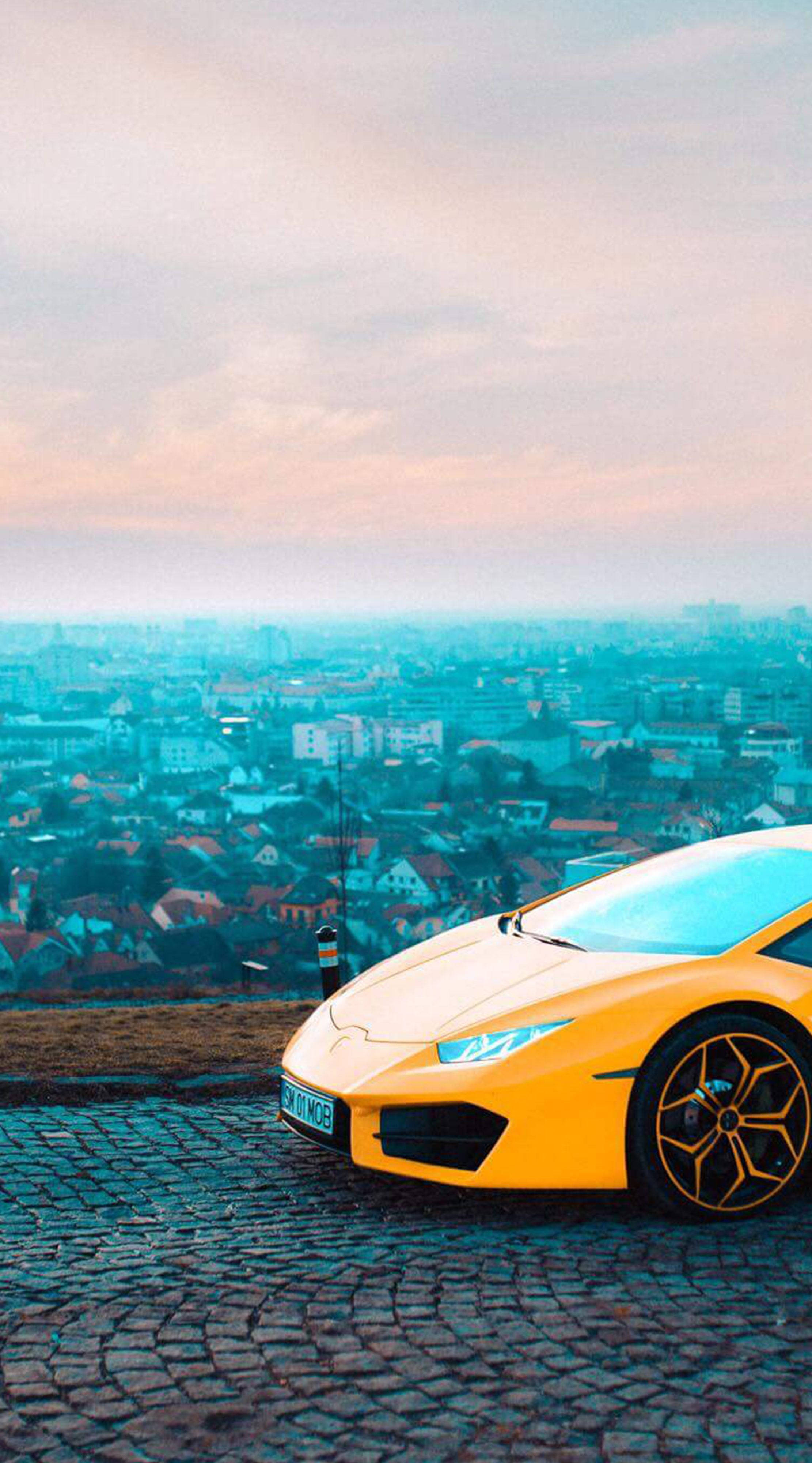 yellow sports car, cobblestone overlook, cityscape, 4K Phone Wallpaper