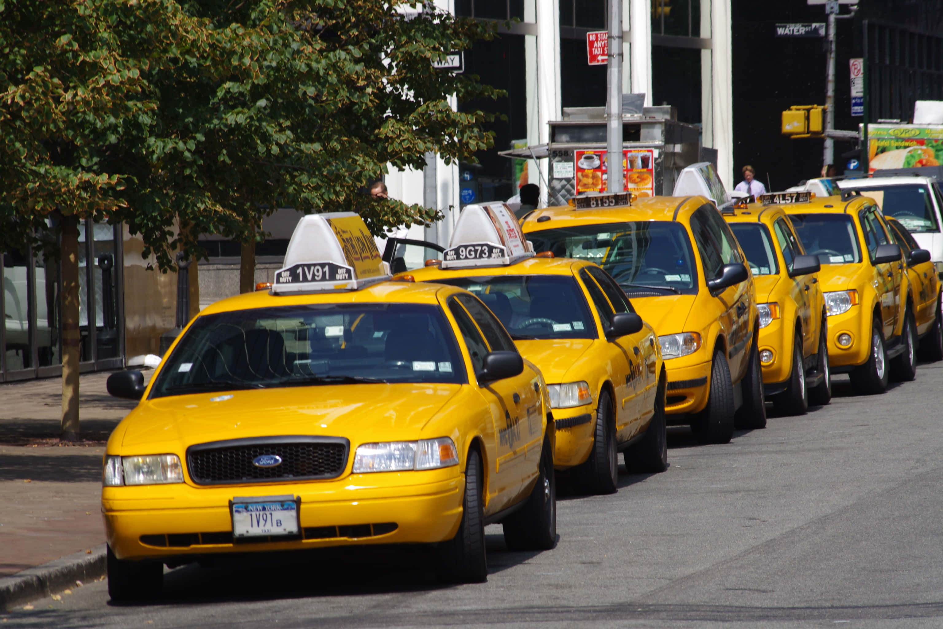 Yellow Cab, city street, clear daylight, 2K Desktop Wallpaper