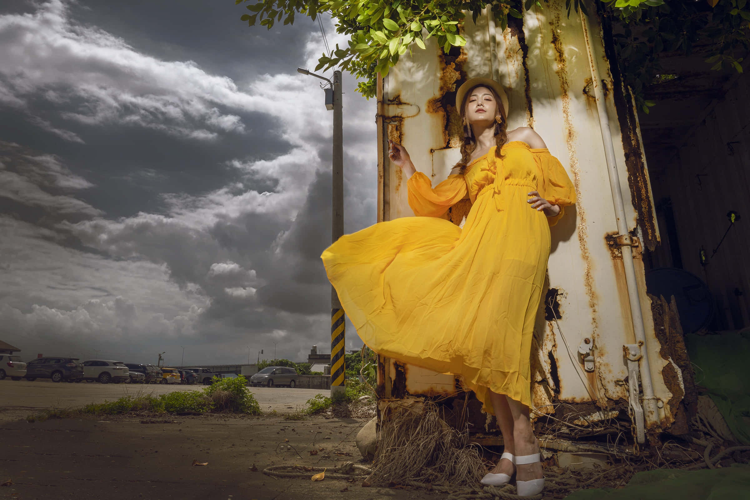 vibrant yellow dress, rusted metal structure, dramatic cloudy sky, Full HD Desktop Wallpaper