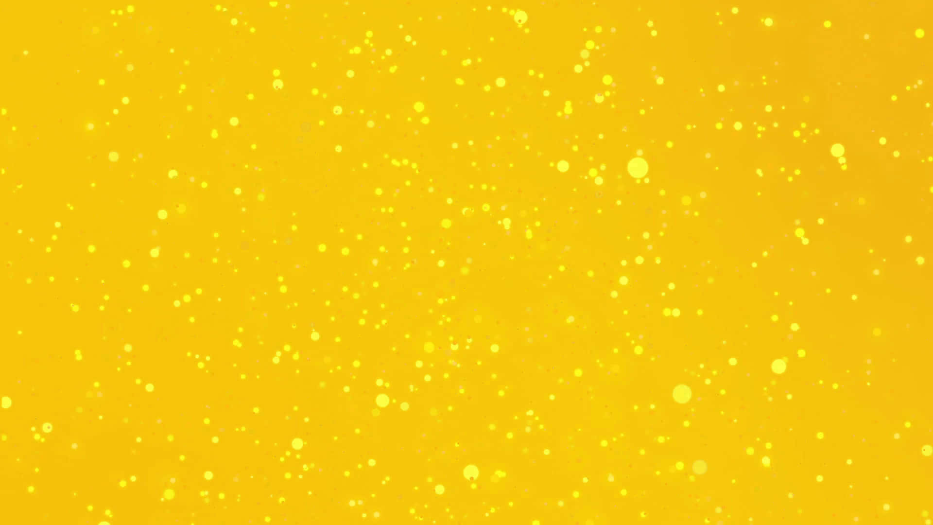 yellow background, glowing particles, sparkling abstract effect, Full HD Desktop Wallpaper