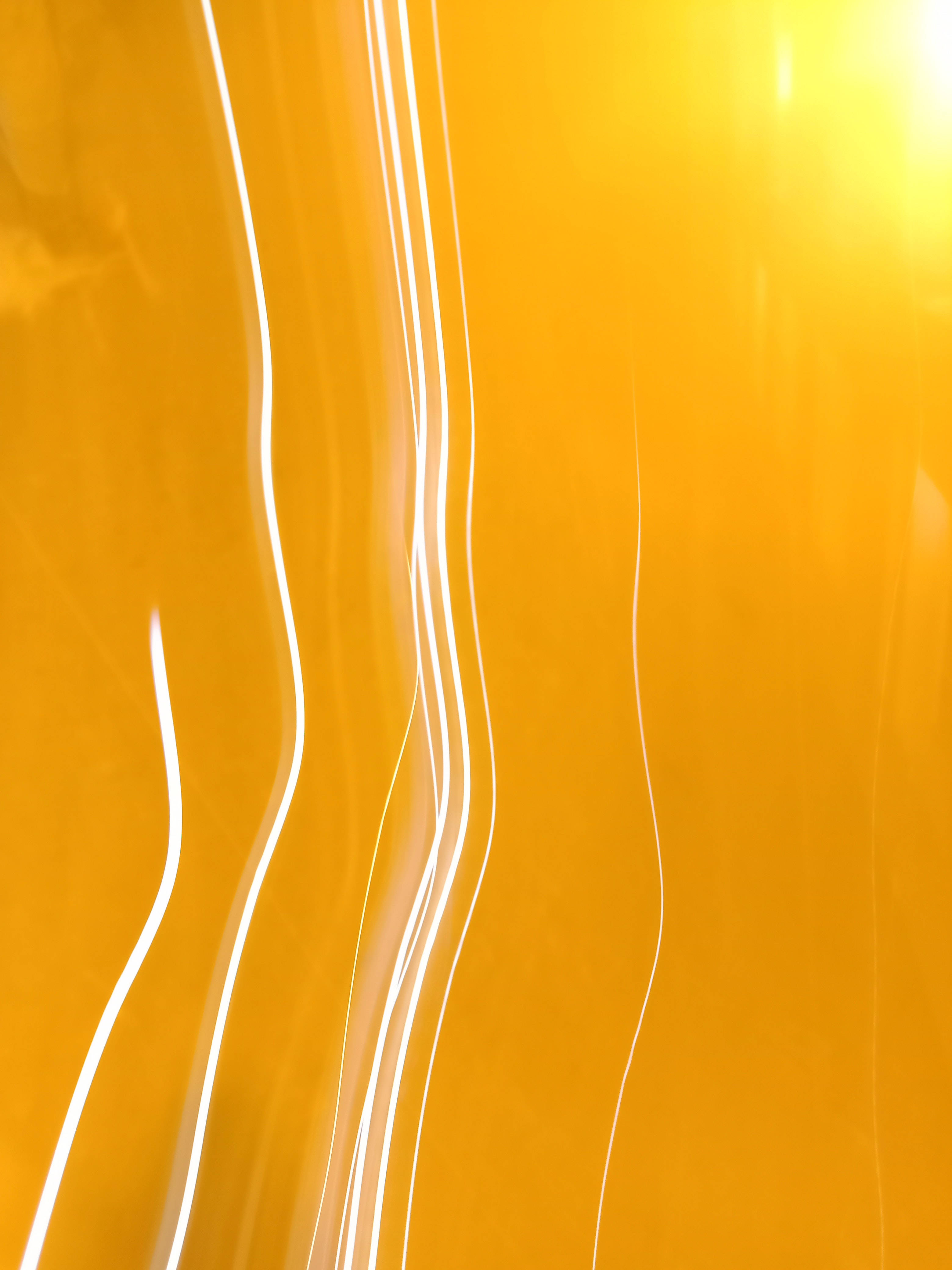 Yellow HD iPhone, golden background, white light streaks, 4K Phone Wallpaper