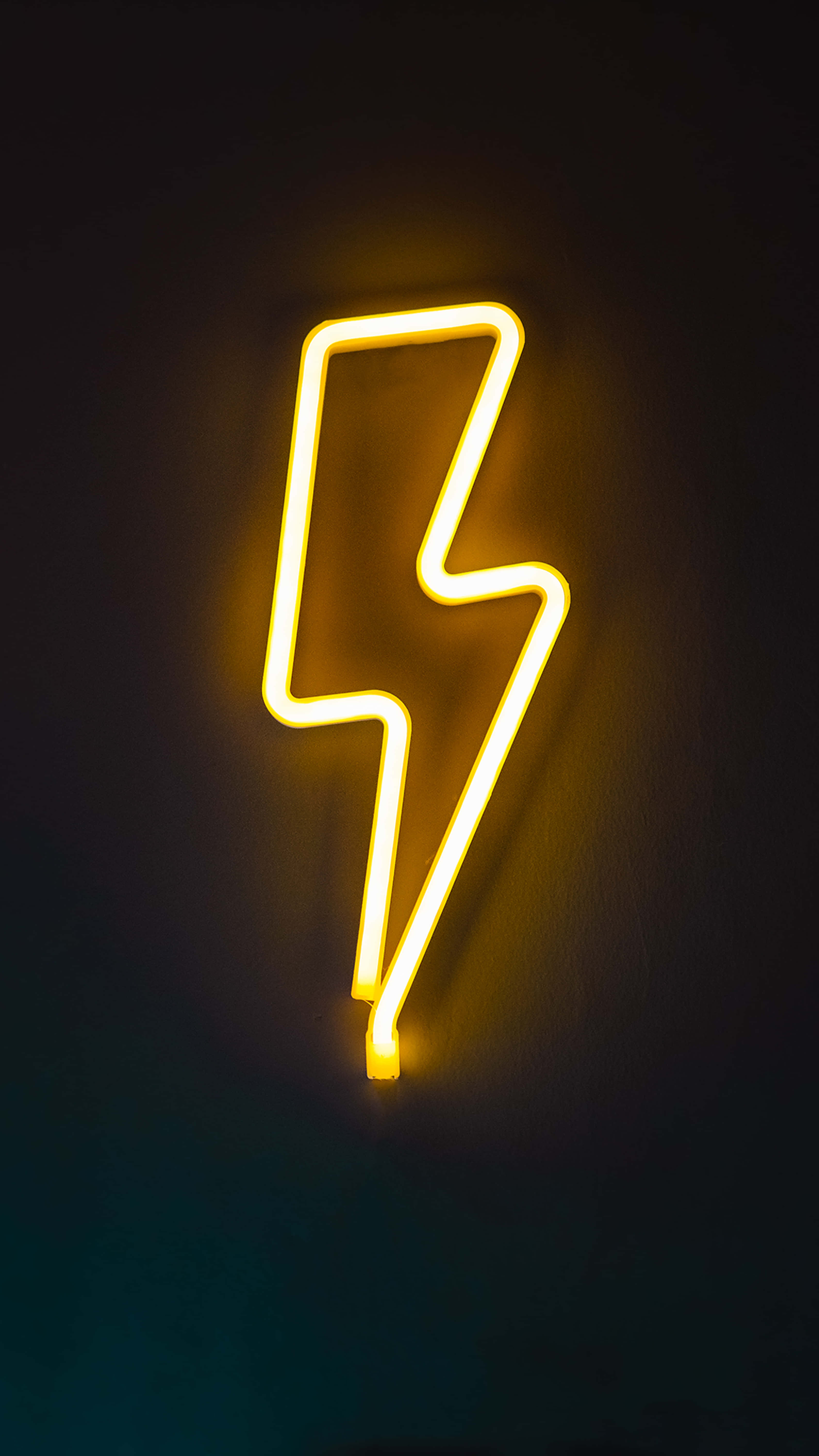 yellow neon lightning bolt sign, glowing yellow neon, dark wall, 5K Phone Wallpaper