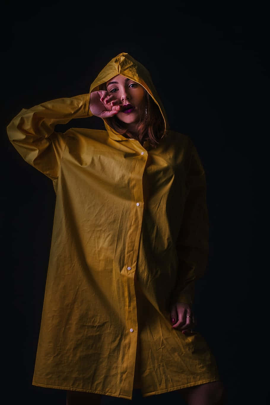 yellow raincoat, mustard yellow raincoat, black background, HD Phone Wallpaper