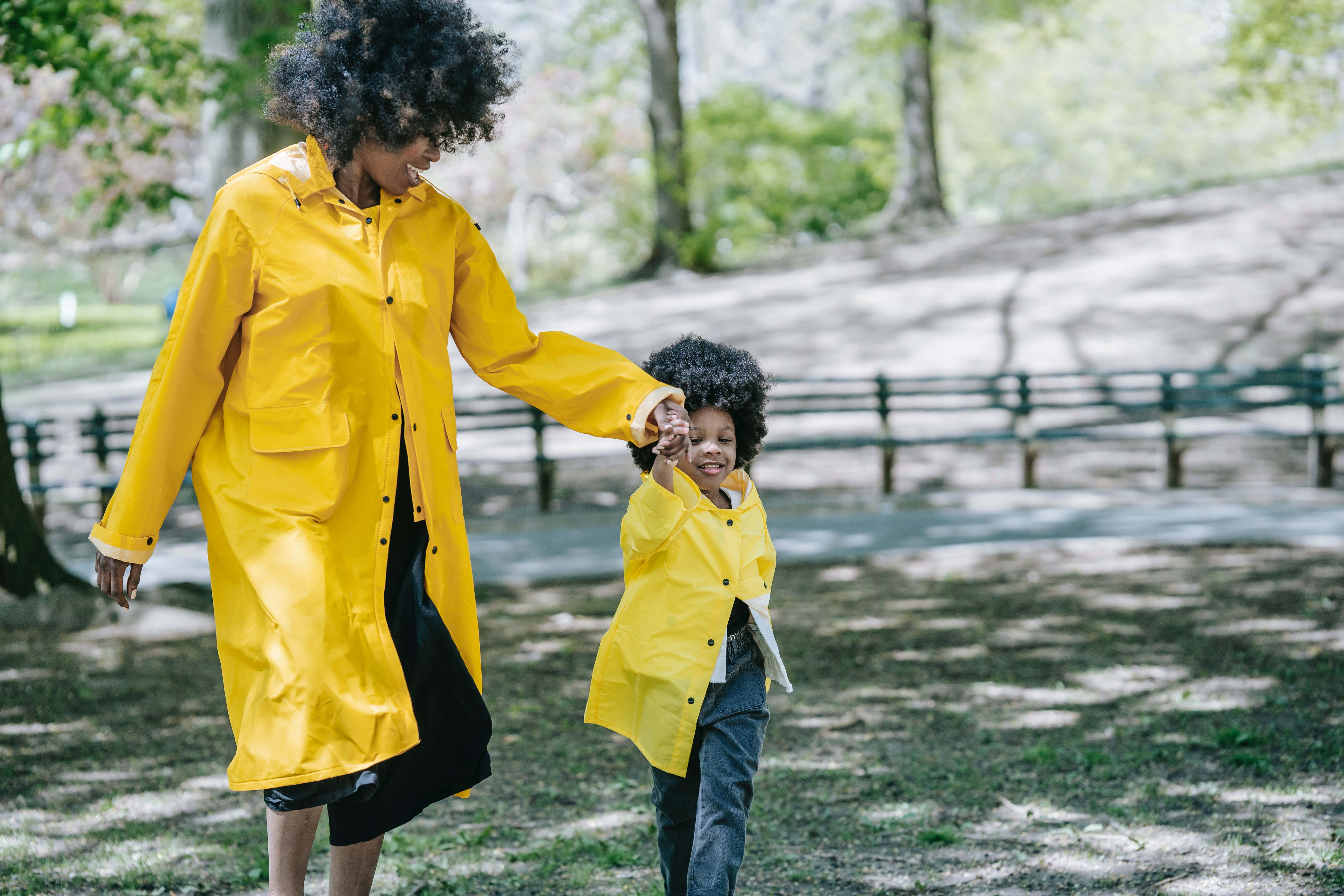 yellow raincoat, mother and child, sunlit park, 5K Desktop Wallpaper
